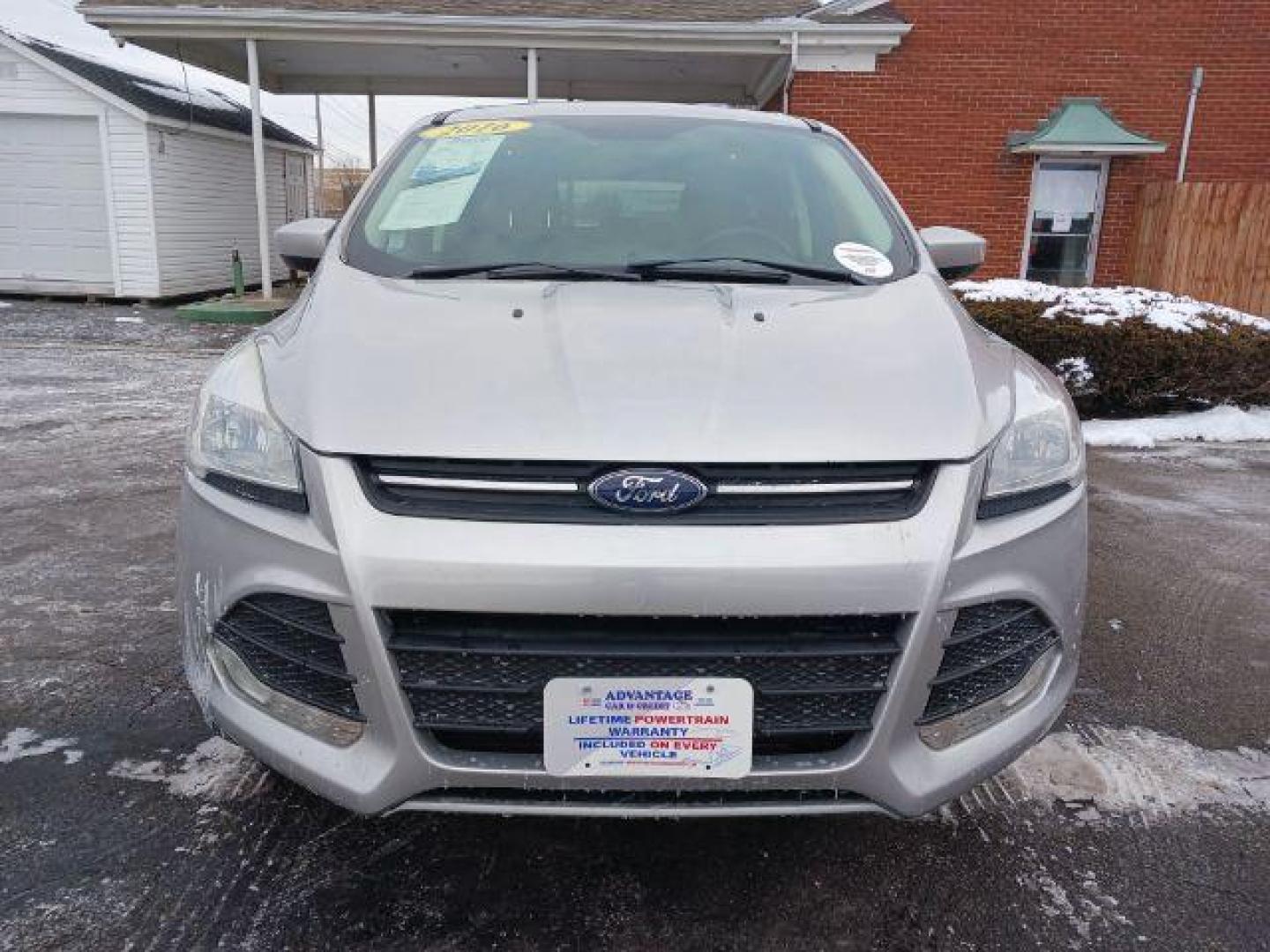 2016 Ingot Silver Metallic Ford Escape SE 4WD (1FMCU9G96GU) with an 2.0L L4 DOHC 16V engine, 6-Speed Automatic transmission, located at 4508 South Dixie Dr, Moraine, OH, 45439, (937) 908-9800, 39.690136, -84.216438 - Photo#1