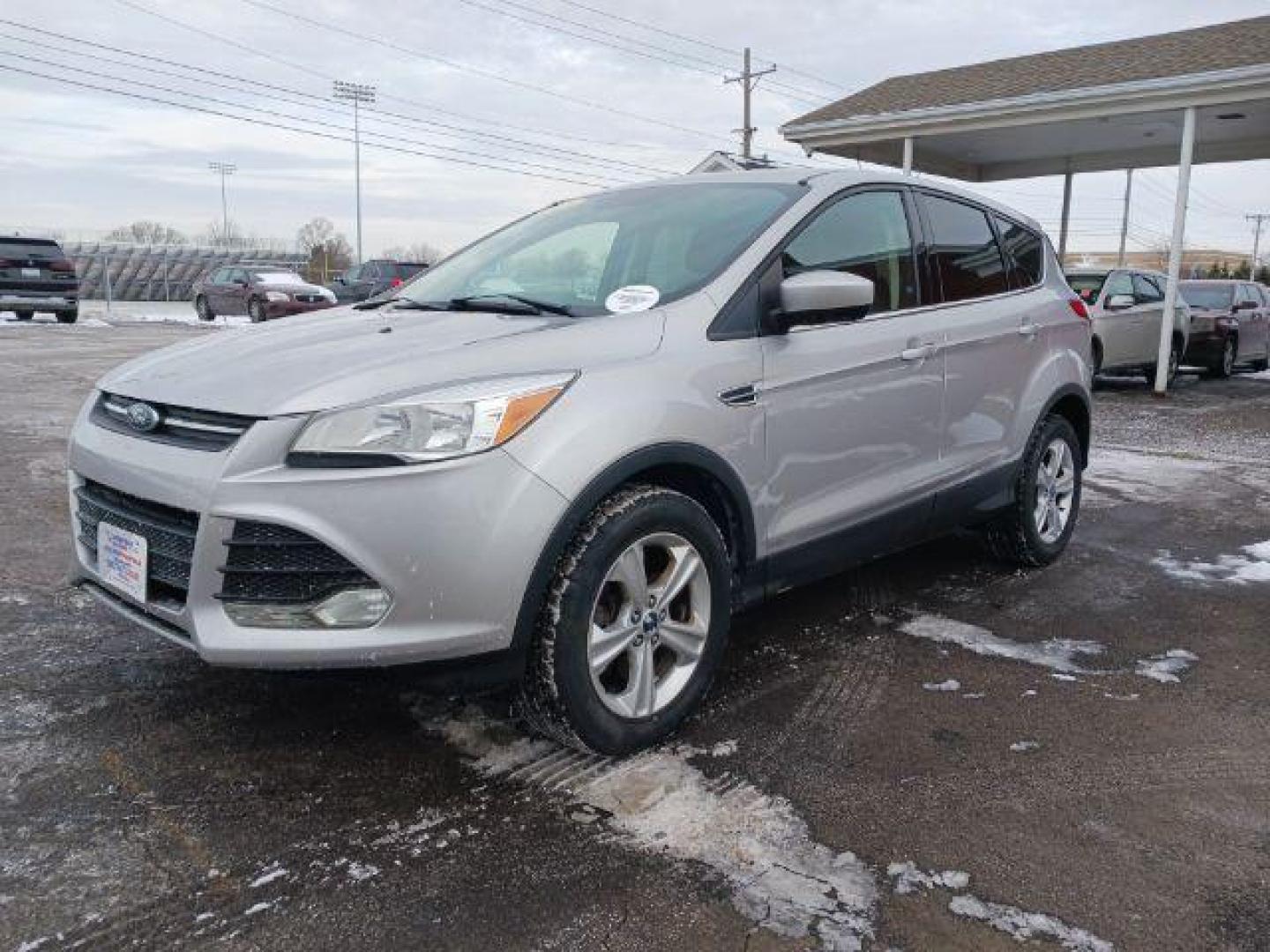 2016 Ingot Silver Metallic Ford Escape SE 4WD (1FMCU9G96GU) with an 2.0L L4 DOHC 16V engine, 6-Speed Automatic transmission, located at 4508 South Dixie Dr, Moraine, OH, 45439, (937) 908-9800, 39.690136, -84.216438 - Photo#2