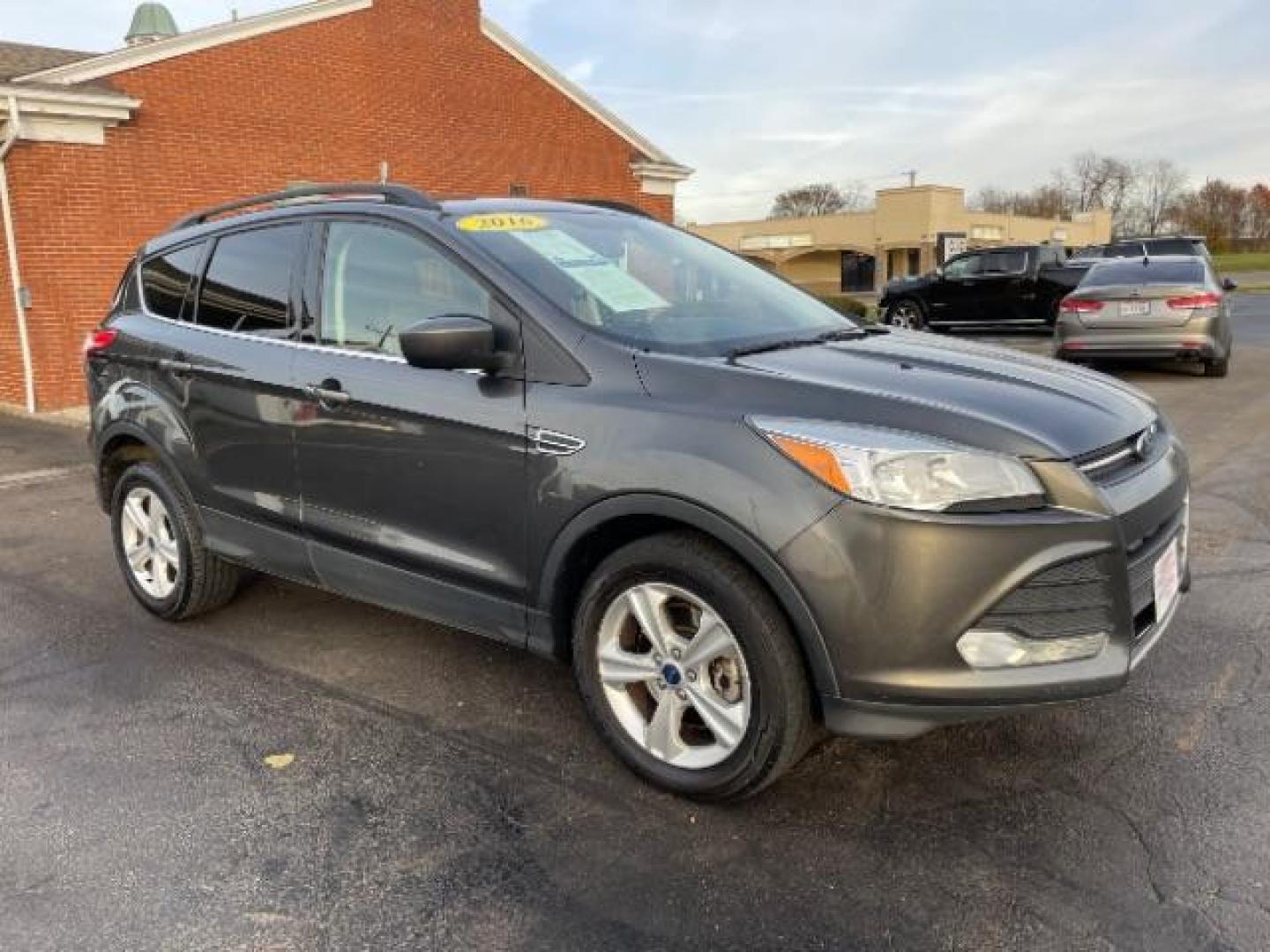 2016 Magnetic Metallic Ford Escape SE 4WD (1FMCU9G99GU) with an 2.0L L4 DOHC 16V engine, 6-Speed Automatic transmission, located at 1230 East Main St, Xenia, OH, 45385, (937) 908-9800, 39.687321, -83.910294 - Photo#0