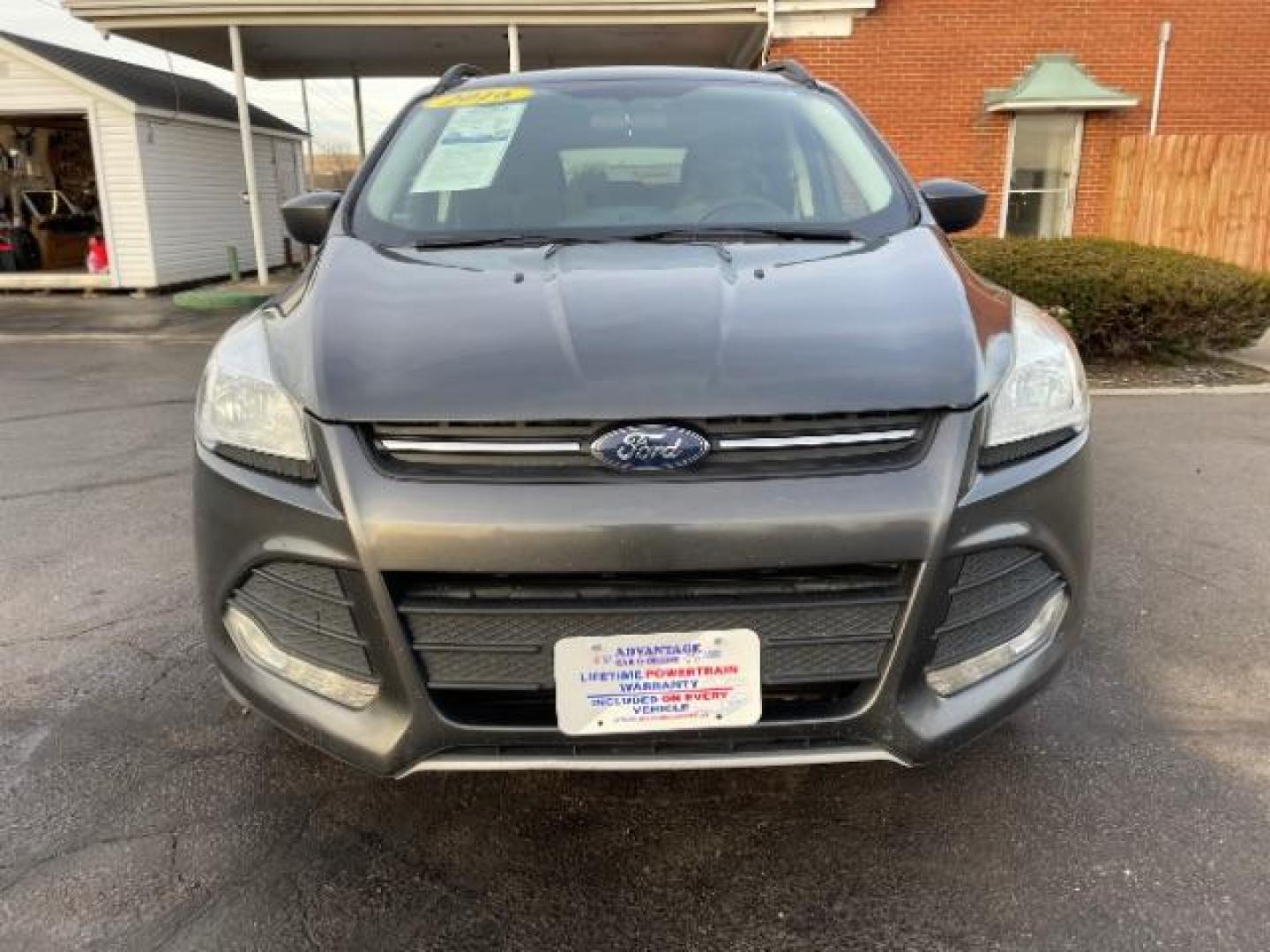 2016 Magnetic Metallic Ford Escape SE 4WD (1FMCU9G99GU) with an 2.0L L4 DOHC 16V engine, 6-Speed Automatic transmission, located at 1230 East Main St, Xenia, OH, 45385, (937) 908-9800, 39.687321, -83.910294 - Photo#5