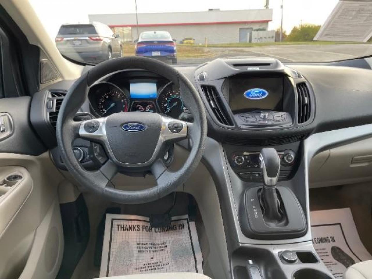 2016 Magnetic Metallic Ford Escape SE 4WD (1FMCU9G99GU) with an 2.0L L4 DOHC 16V engine, 6-Speed Automatic transmission, located at 1230 East Main St, Xenia, OH, 45385, (937) 908-9800, 39.687321, -83.910294 - Photo#7