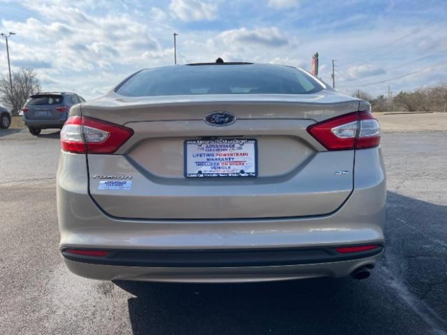 2016 Brown Ford Fusion SE (3FA6P0H70GR) with an 2.5L L4 DOHC 16V engine, 6-Speed Automatic transmission, located at 1951 S Dayton Lakeview Rd., New Carlisle, OH, 45344, (937) 908-9800, 39.890999, -84.050255 - Photo#5