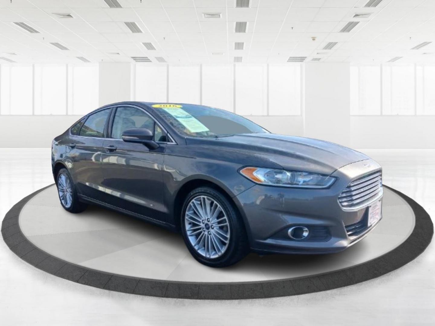 2016 Shadow Black Ford Fusion SE AWD (3FA6P0T99GR) with an 2.0L L4 DOHC 16V engine, 6A transmission, located at 1099 N County Rd 25A, OH, 45373, (937) 908-9800, 40.057079, -84.212883 - Photo#0