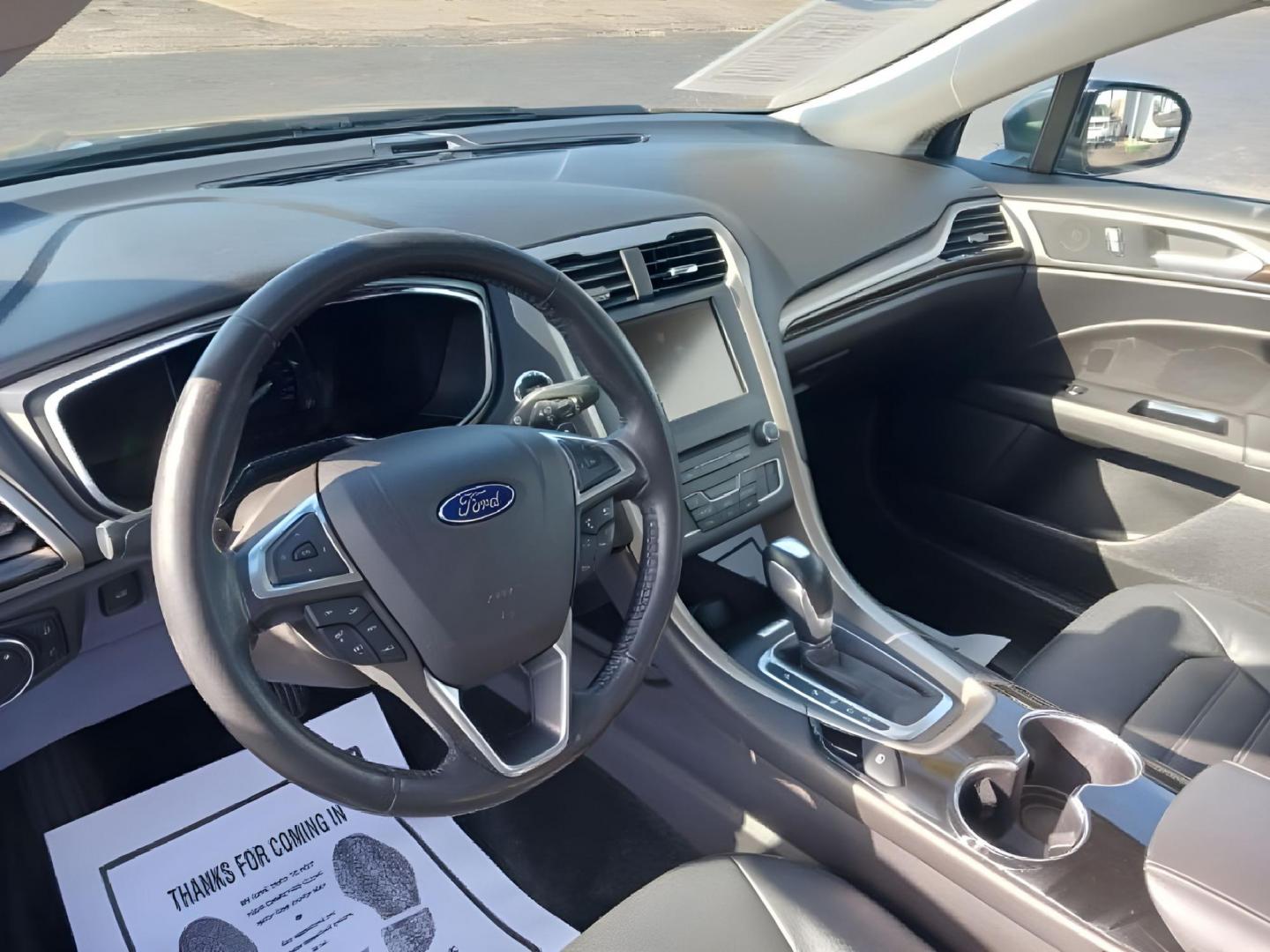 2016 Shadow Black Ford Fusion SE AWD (3FA6P0T99GR) with an 2.0L L4 DOHC 16V engine, 6A transmission, located at 1099 N County Rd 25A, OH, 45373, (937) 908-9800, 40.057079, -84.212883 - Photo#5