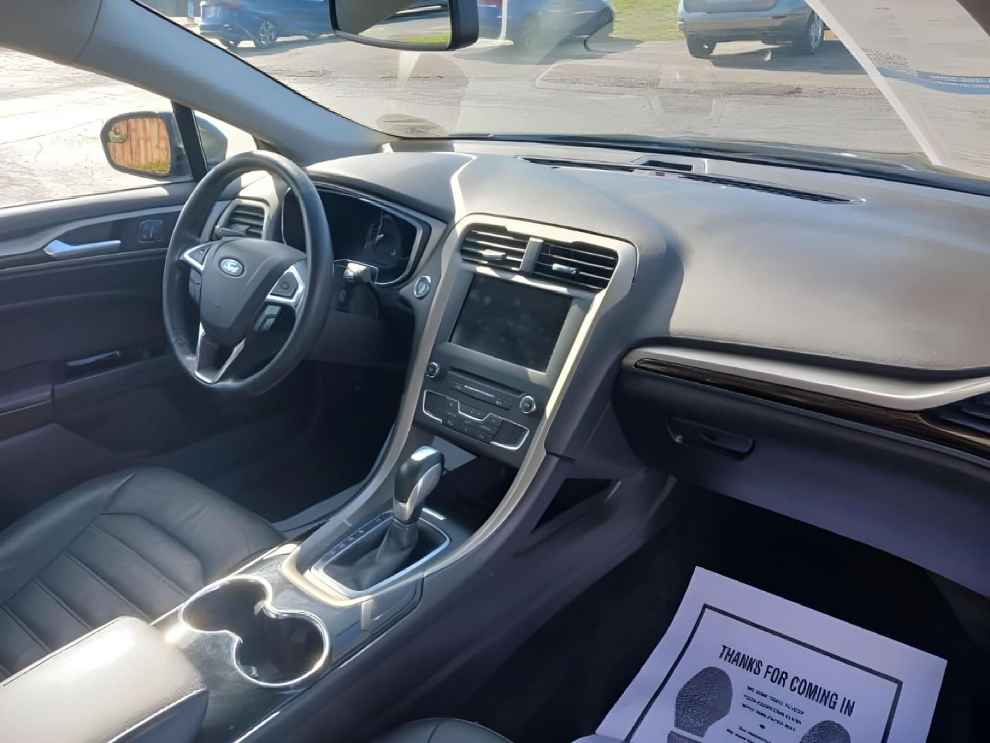 2016 Shadow Black Ford Fusion SE AWD (3FA6P0T99GR) with an 2.0L L4 DOHC 16V engine, 6A transmission, located at 1099 N County Rd 25A, OH, 45373, (937) 908-9800, 40.057079, -84.212883 - Photo#7