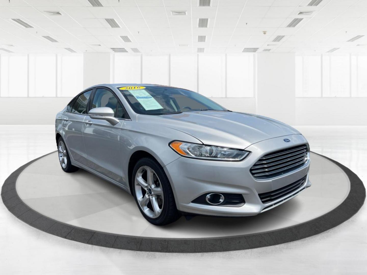 2016 Ingot Silver Metallic Ford Fusion (3FA6P0T90GR) with an 2.0L L4 DOHC 16V engine, 6-Speed Automatic transmission, located at 1951 S Dayton Lakeview Rd., New Carlisle, OH, 45344, (937) 908-9800, 39.890999, -84.050255 - Photo#0