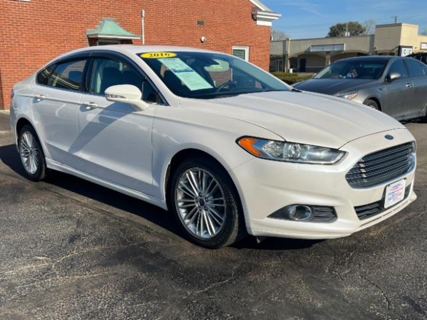 2016 White Platinum Metallic Tri-Coat Ford Fusion SE AWD (3FA6P0T92GR) with an 2.0L L4 DOHC 16V engine, 6-Speed Automatic transmission, located at 4508 South Dixie Dr, Moraine, OH, 45439, (937) 908-9800, 39.690136, -84.216438 - Photo#0