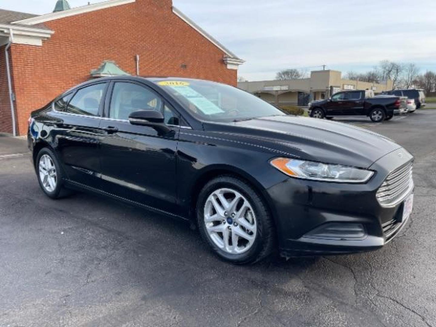 2016 Shadow Black Ford Fusion SE (3FA6P0H72GR) with an 2.5L L4 DOHC 16V engine, 6-Speed Automatic transmission, located at 1230 East Main St, Xenia, OH, 45385, (937) 908-9800, 39.687321, -83.910294 - Photo#0