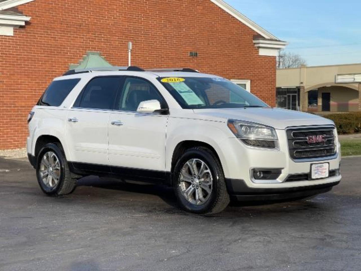 2016 Summit White GMC Acadia SLT-1 FWD (1GKKRRKD7GJ) with an 3.6L V6 DOHC 24V engine, 6-Speed Automatic transmission, located at 1230 East Main St, Xenia, OH, 45385, (937) 908-9800, 39.687321, -83.910294 - Photo#0