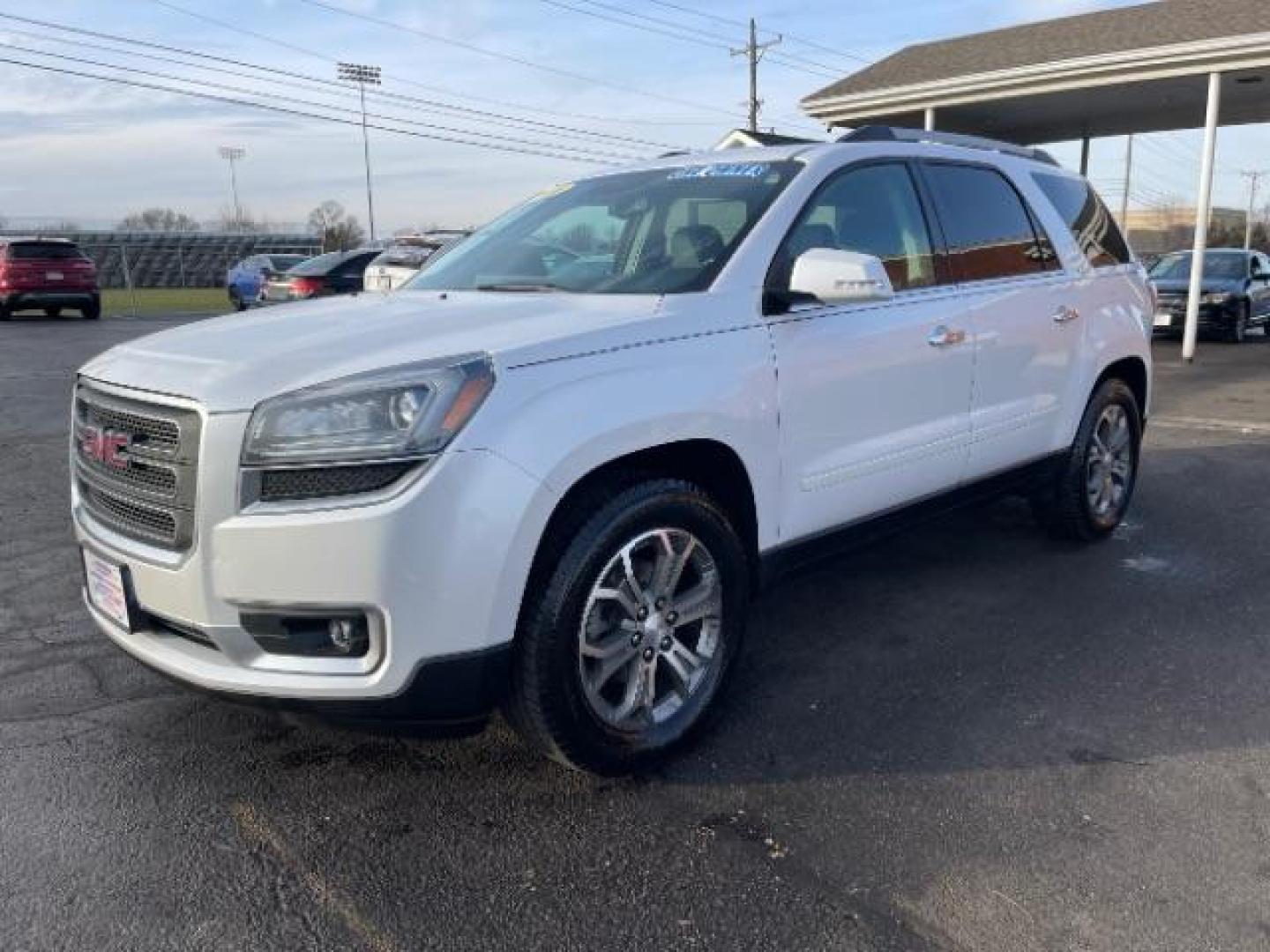 2016 Summit White GMC Acadia SLT-1 FWD (1GKKRRKD7GJ) with an 3.6L V6 DOHC 24V engine, 6-Speed Automatic transmission, located at 1230 East Main St, Xenia, OH, 45385, (937) 908-9800, 39.687321, -83.910294 - Photo#1