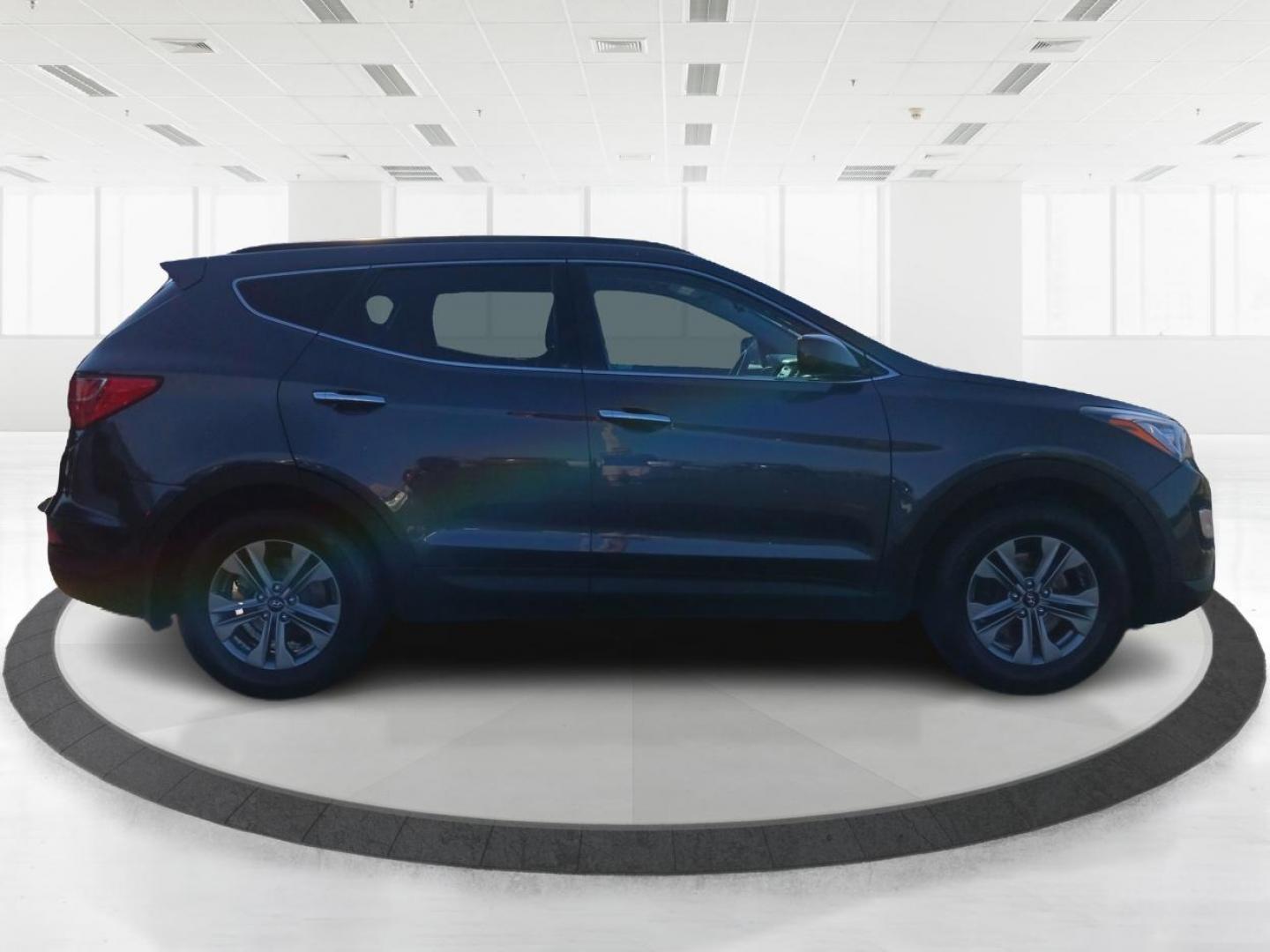 2016 Marlin Blue Hyundai Santa Fe Sport 2.4 AWD (5XYZUDLB5GG) with an 2.4L L4 DOHC 16V engine, 6-Speed Automatic transmission, located at 1951 S Dayton Lakeview Rd., New Carlisle, OH, 45344, (937) 908-9800, 39.890999, -84.050255 - Photo#1