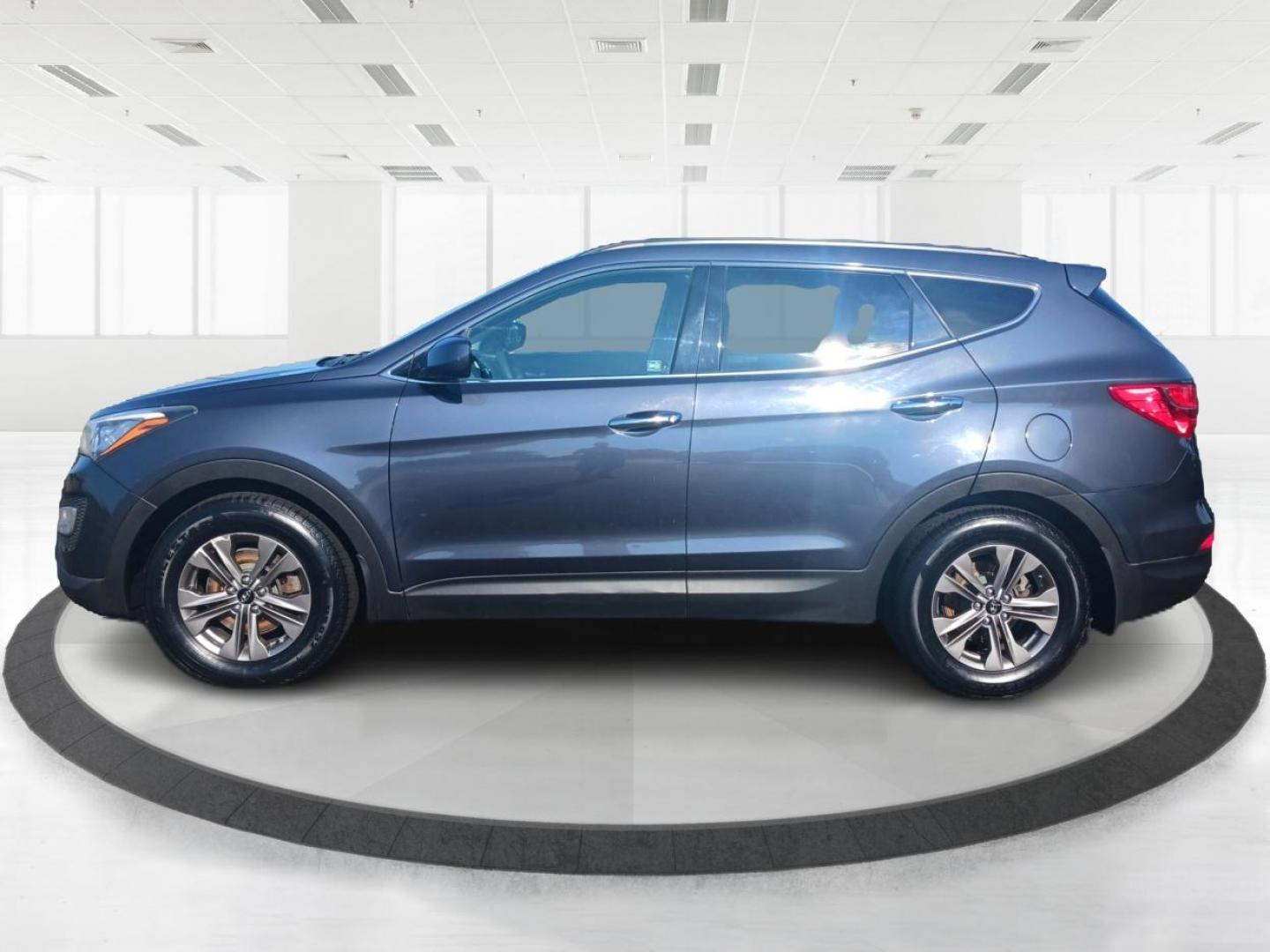 2016 Marlin Blue Hyundai Santa Fe Sport 2.4 AWD (5XYZUDLB5GG) with an 2.4L L4 DOHC 16V engine, 6-Speed Automatic transmission, located at 1951 S Dayton Lakeview Rd., New Carlisle, OH, 45344, (937) 908-9800, 39.890999, -84.050255 - Photo#5