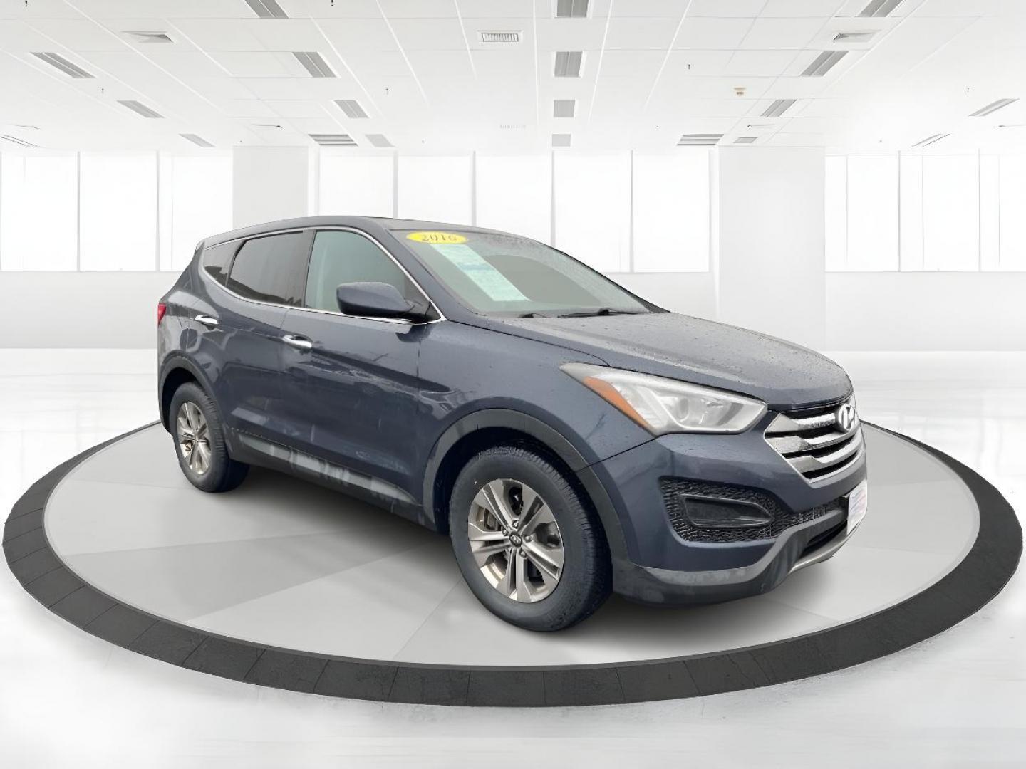 2016 Marlin Blue Hyundai Santa Fe (5XYZTDLB9GG) with an 2.4L L4 DOHC 16V engine, 6-Speed Automatic transmission, located at 401 Woodman Dr, Riverside, OH, 45431, (937) 908-9800, 39.763779, -84.122063 - Photo#0