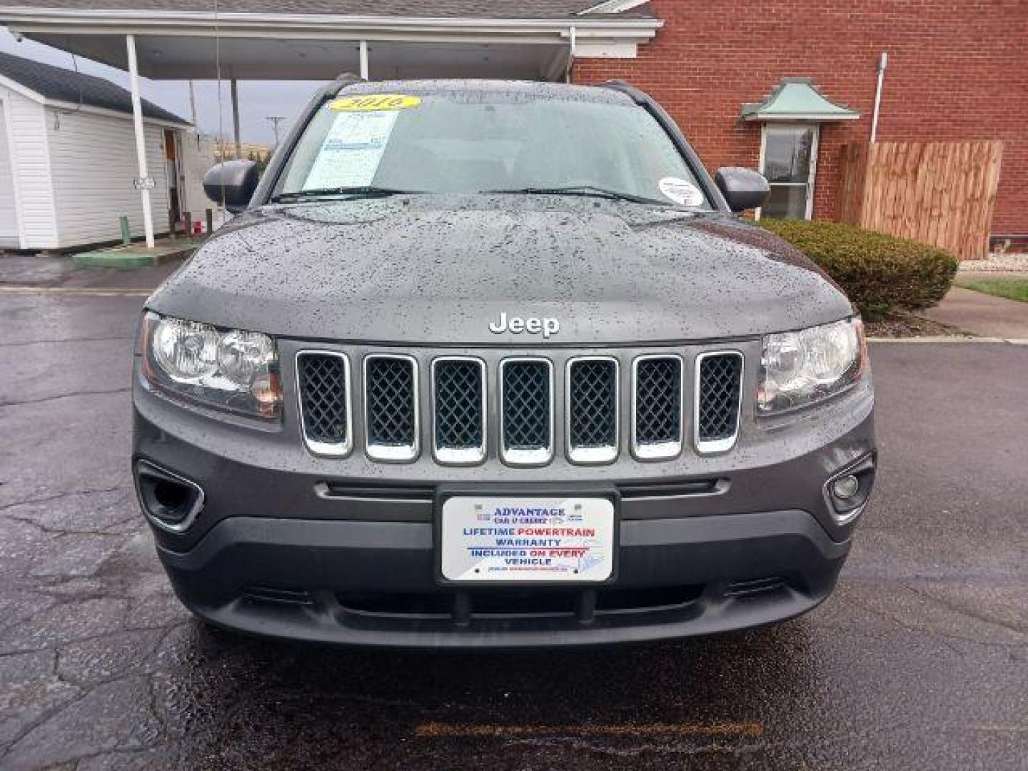 2016 Gray Jeep Compass Latitude 4WD (1C4NJDEB6GD) with an 2.4L L4 DOHC 16V engine, 6-Speed Automatic transmission, located at 880 E. National Road, Vandalia, OH, 45377, (937) 908-9800, 39.892189, -84.181015 - Photo#1