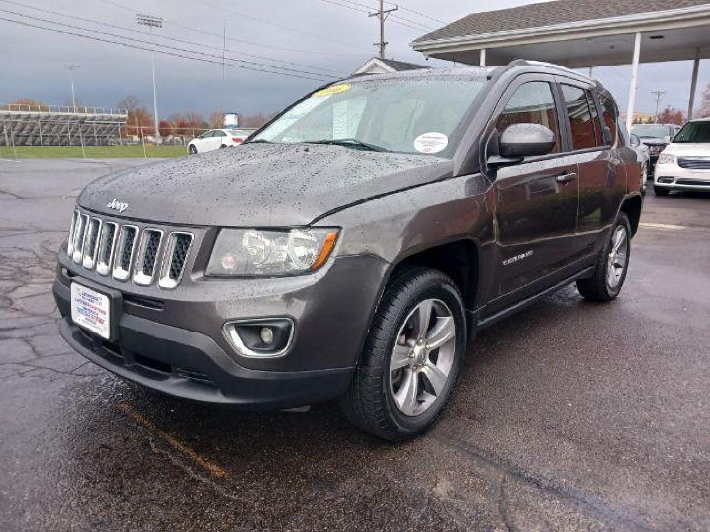 2016 Gray Jeep Compass Latitude 4WD (1C4NJDEB6GD) with an 2.4L L4 DOHC 16V engine, 6-Speed Automatic transmission, located at 880 E. National Road, Vandalia, OH, 45377, (937) 908-9800, 39.892189, -84.181015 - Photo#2