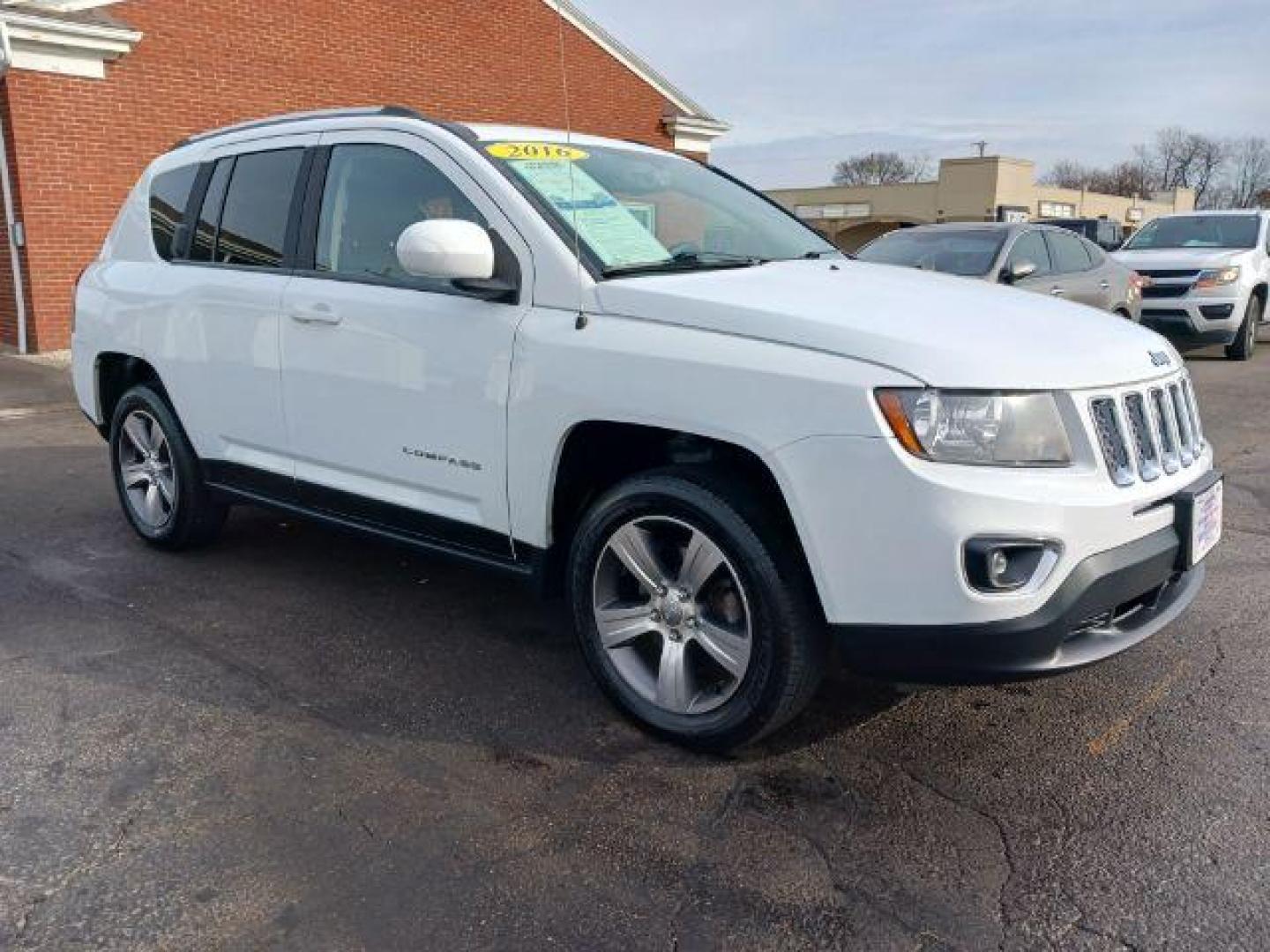 2016 White Jeep Compass Latitude FWD (1C4NJCEA2GD) with an 2.0L L4 DOHC 16V engine, Continuously Variable Transmission transmission, located at 880 E. National Road, Vandalia, OH, 45377, (937) 908-9800, 39.892189, -84.181015 - Photo#0