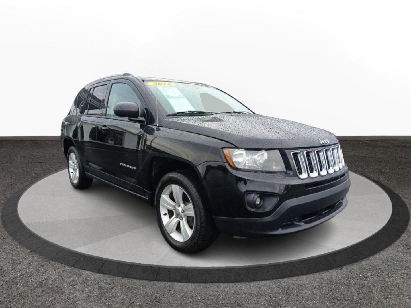 2016 Black Jeep Compass (1C4NJCBA6GD) with an 2.0L L4 DOHC 16V engine, located at 1951 S Dayton Lakeview Rd., New Carlisle, OH, 45344, (937) 908-9800, 39.890999, -84.050255 - Photo#0