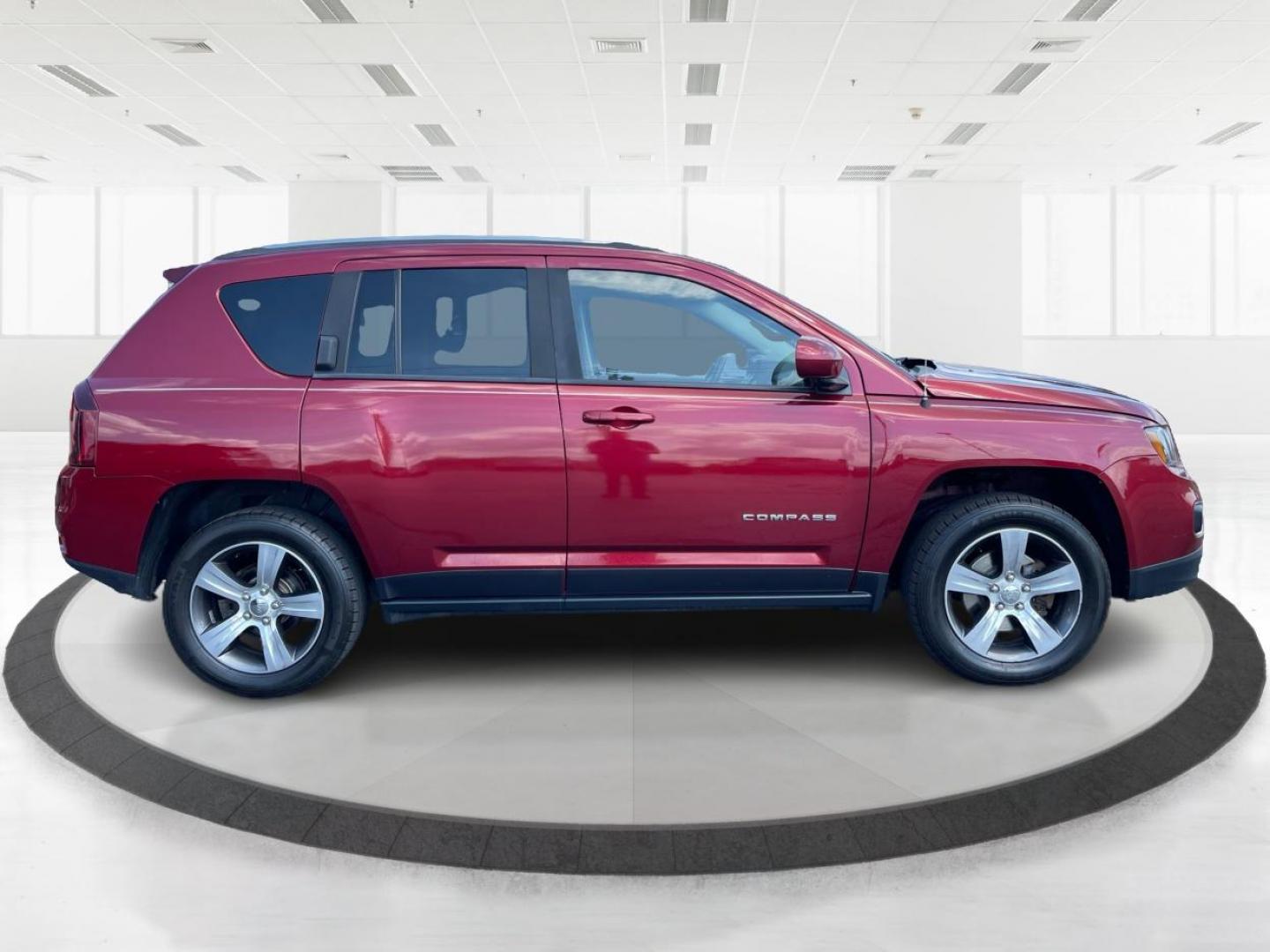 2016 Red Jeep Compass Latitude 4WD (1C4NJDEB3GD) with an 2.4L L4 DOHC 16V engine, 6A transmission, located at 1230 East Main St, Xenia, OH, 45385, (937) 908-9800, 39.687321, -83.910294 - Photo#1