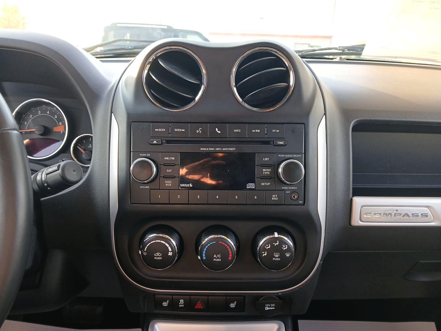 2016 Jeep Compass Latitude FWD (1C4NJCEB4GD) with an 2.4L L4 DOHC 16V engine, Continuously Variable Transmission transmission, located at 1230 East Main St, Xenia, OH, 45385, (937) 908-9800, 39.688026, -83.910172 - 2016 Jeep Compass Latitude FWD - Photo#12