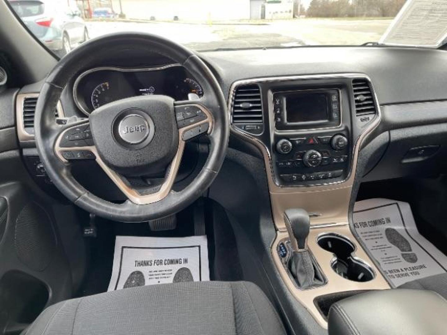 2016 Brilliant Black Crystal Pearl Coat Jeep Grand Cherokee Laredo 4WD (1C4RJFAG0GC) with an 3.6L V6 DOHC 24V engine, 8-Speed Automatic transmission, located at 1230 East Main St, Xenia, OH, 45385, (937) 908-9800, 39.687321, -83.910294 - Photo#7