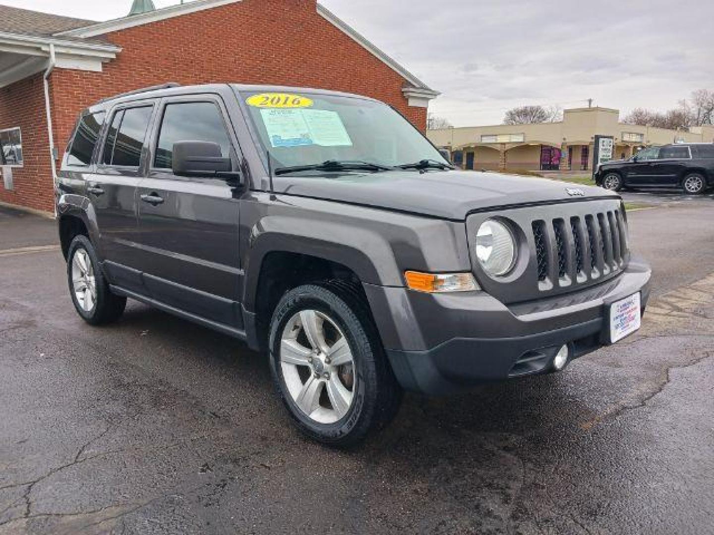 2016 Gray Jeep Patriot Latitude 4WD (1C4NJRFB8GD) with an 2.4L L4 DOHC 16V engine, located at 1951 S Dayton Lakeview Rd., New Carlisle, OH, 45344, (937) 908-9800, 39.890999, -84.050255 - Photo#0