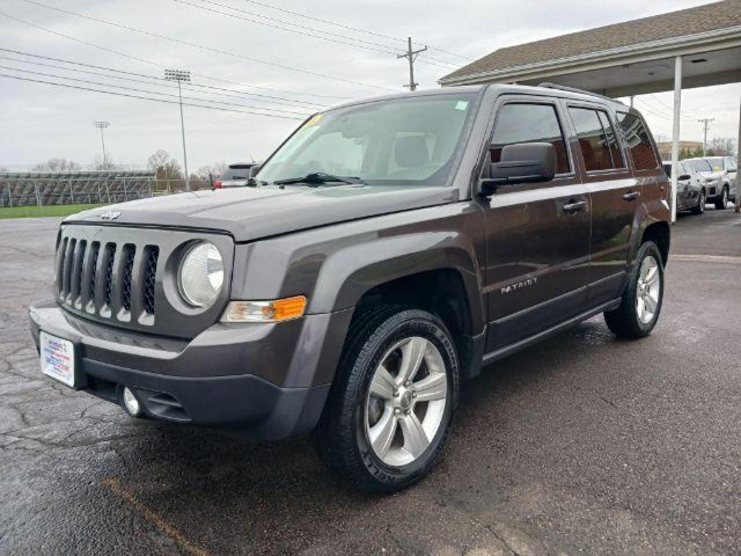 2016 Gray Jeep Patriot Latitude 4WD (1C4NJRFB8GD) with an 2.4L L4 DOHC 16V engine, located at 1951 S Dayton Lakeview Rd., New Carlisle, OH, 45344, (937) 908-9800, 39.890999, -84.050255 - Photo#2