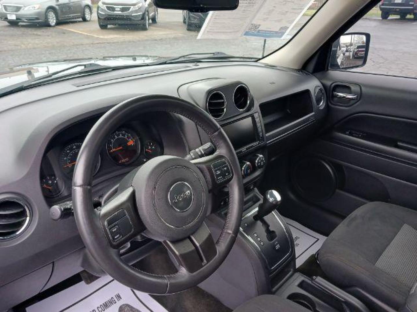 2016 Gray Jeep Patriot Latitude 4WD (1C4NJRFB8GD) with an 2.4L L4 DOHC 16V engine, located at 1951 S Dayton Lakeview Rd., New Carlisle, OH, 45344, (937) 908-9800, 39.890999, -84.050255 - Photo#6