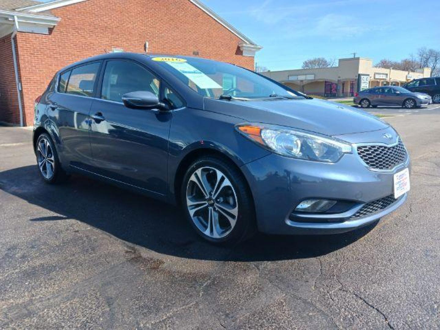 2016 Steel Blue Kia Forte 5-Door EX (KNAFX5A85G5) with an 2.0L L4 DOHC 16V engine, 6-Speed Automatic transmission, located at 1951 S Dayton Lakeview Rd., New Carlisle, OH, 45344, (937) 908-9800, 39.890999, -84.050255 - Photo#0