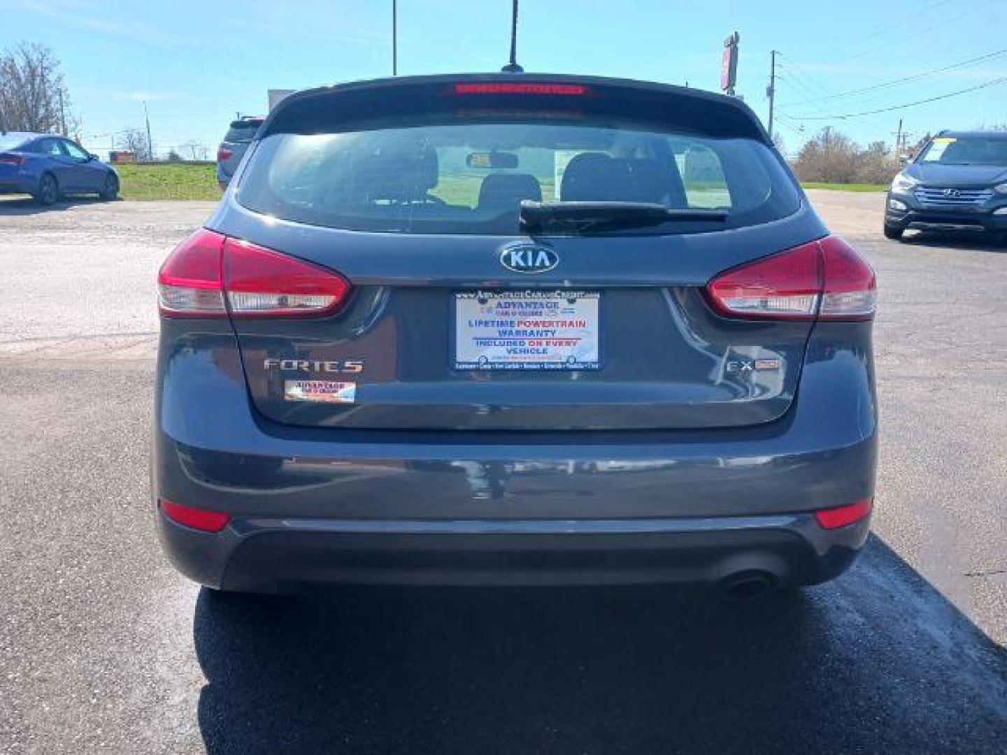 2016 Steel Blue Kia Forte 5-Door EX (KNAFX5A85G5) with an 2.0L L4 DOHC 16V engine, 6-Speed Automatic transmission, located at 1951 S Dayton Lakeview Rd., New Carlisle, OH, 45344, (937) 908-9800, 39.890999, -84.050255 - Photo#5