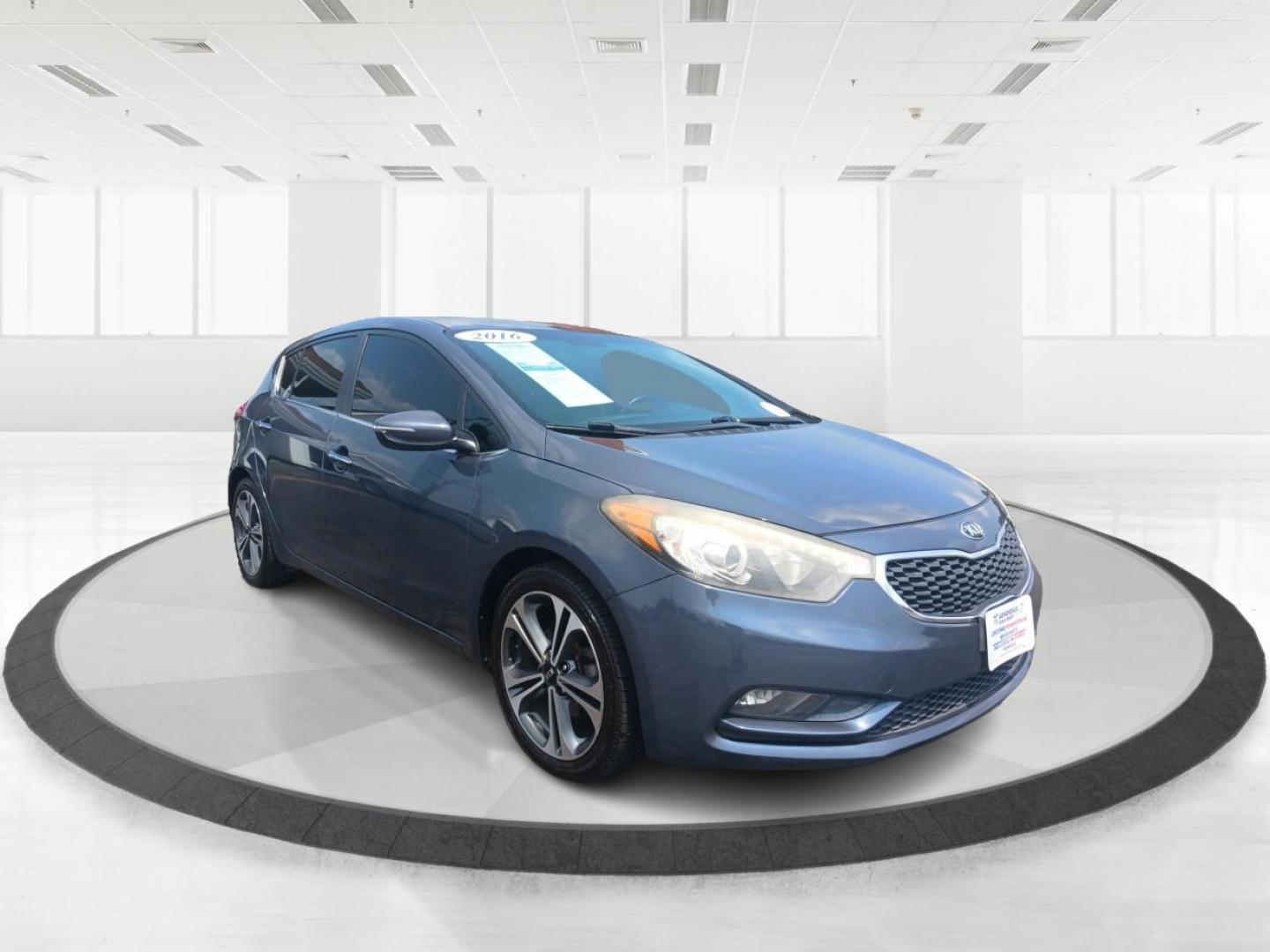 2016 Steel Blue Kia Forte 5-Door (KNAFX5A89G5) with an 2.0L L4 DOHC 16V engine, 6-Speed Automatic transmission, located at 1230 East Main St, Xenia, OH, 45385, (937) 908-9800, 39.687321, -83.910294 - Photo#0