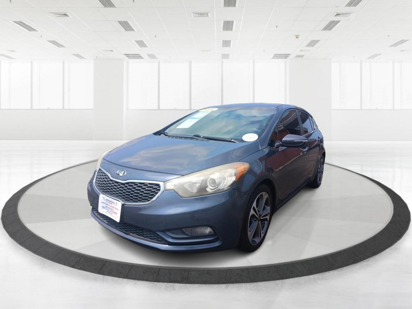 2016 Steel Blue Kia Forte 5-Door (KNAFX5A89G5) with an 2.0L L4 DOHC 16V engine, 6-Speed Automatic transmission, located at 1230 East Main St, Xenia, OH, 45385, (937) 908-9800, 39.687321, -83.910294 - Photo#7