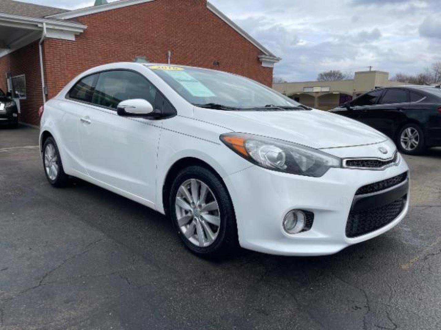 2016 Snow White Pearl Kia Forte Koup EX (KNAFX6A87G5) with an 2.0L L4 DOHC 16V engine, 6-Speed Automatic transmission, located at 880 E. National Road, Vandalia, OH, 45377, (937) 908-9800, 39.892189, -84.181015 - Photo#0