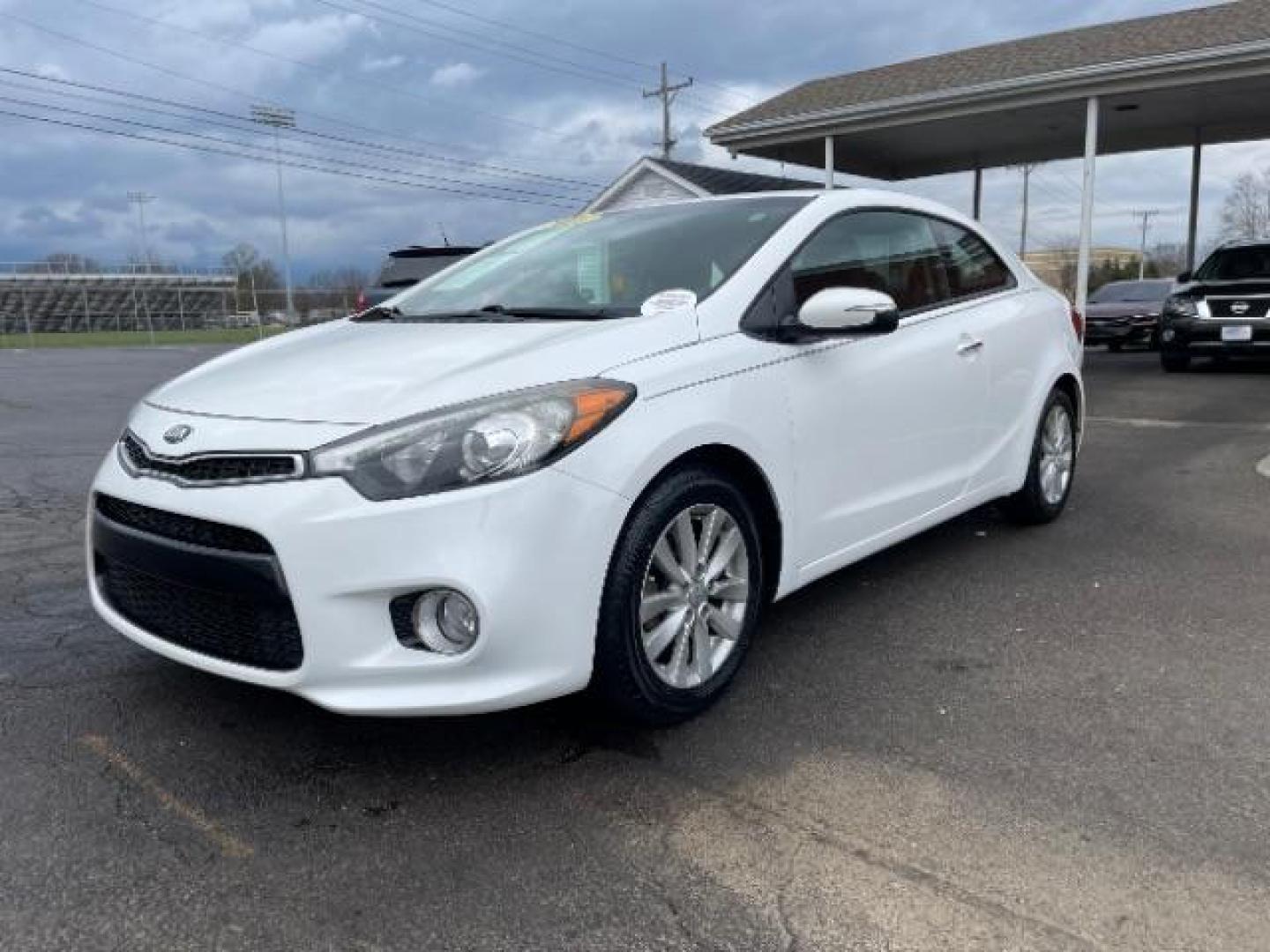 2016 Snow White Pearl Kia Forte Koup EX (KNAFX6A87G5) with an 2.0L L4 DOHC 16V engine, 6-Speed Automatic transmission, located at 880 E. National Road, Vandalia, OH, 45377, (937) 908-9800, 39.892189, -84.181015 - Photo#1