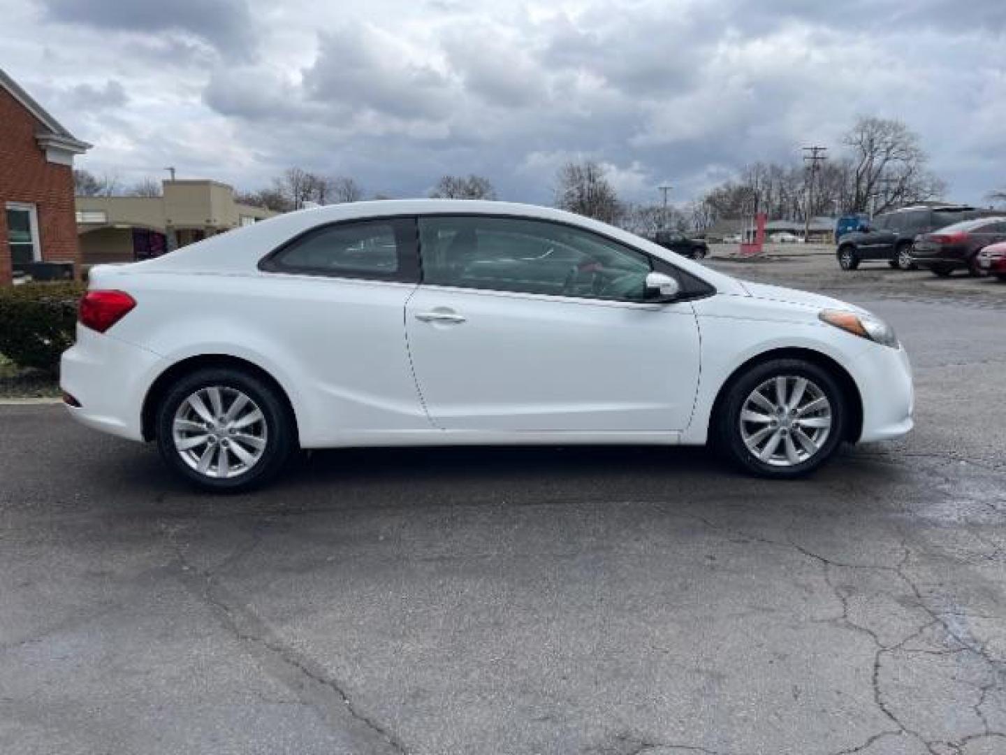 2016 Snow White Pearl Kia Forte Koup EX (KNAFX6A87G5) with an 2.0L L4 DOHC 16V engine, 6-Speed Automatic transmission, located at 880 E. National Road, Vandalia, OH, 45377, (937) 908-9800, 39.892189, -84.181015 - Photo#3