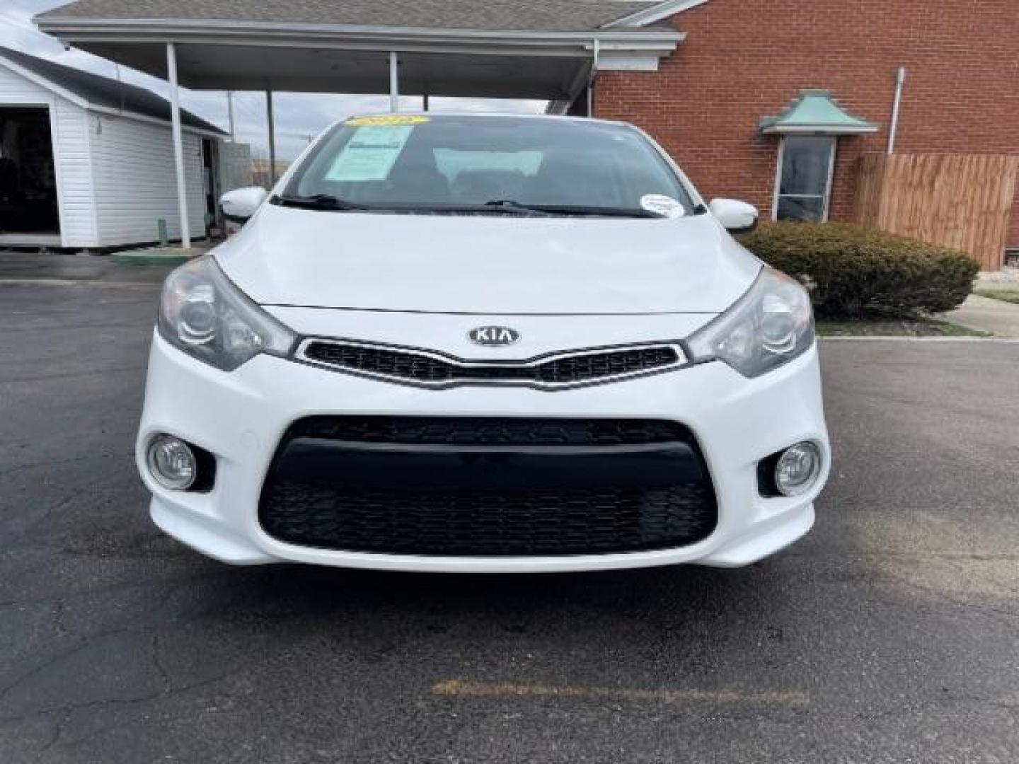 2016 Snow White Pearl Kia Forte Koup EX (KNAFX6A87G5) with an 2.0L L4 DOHC 16V engine, 6-Speed Automatic transmission, located at 880 E. National Road, Vandalia, OH, 45377, (937) 908-9800, 39.892189, -84.181015 - Photo#4