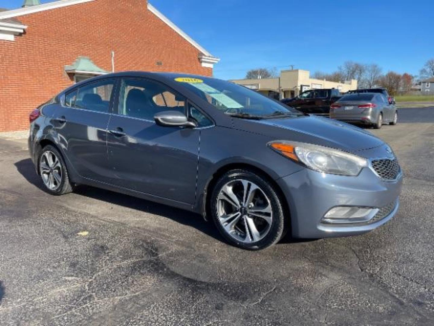 2016 Graphite Steel Kia Forte EX (KNAFX4A85G5) with an 2.0L L4 DOHC 16V engine, 6-Speed Automatic transmission, located at 1230 East Main St, Xenia, OH, 45385, (937) 908-9800, 39.687321, -83.910294 - Photo#0