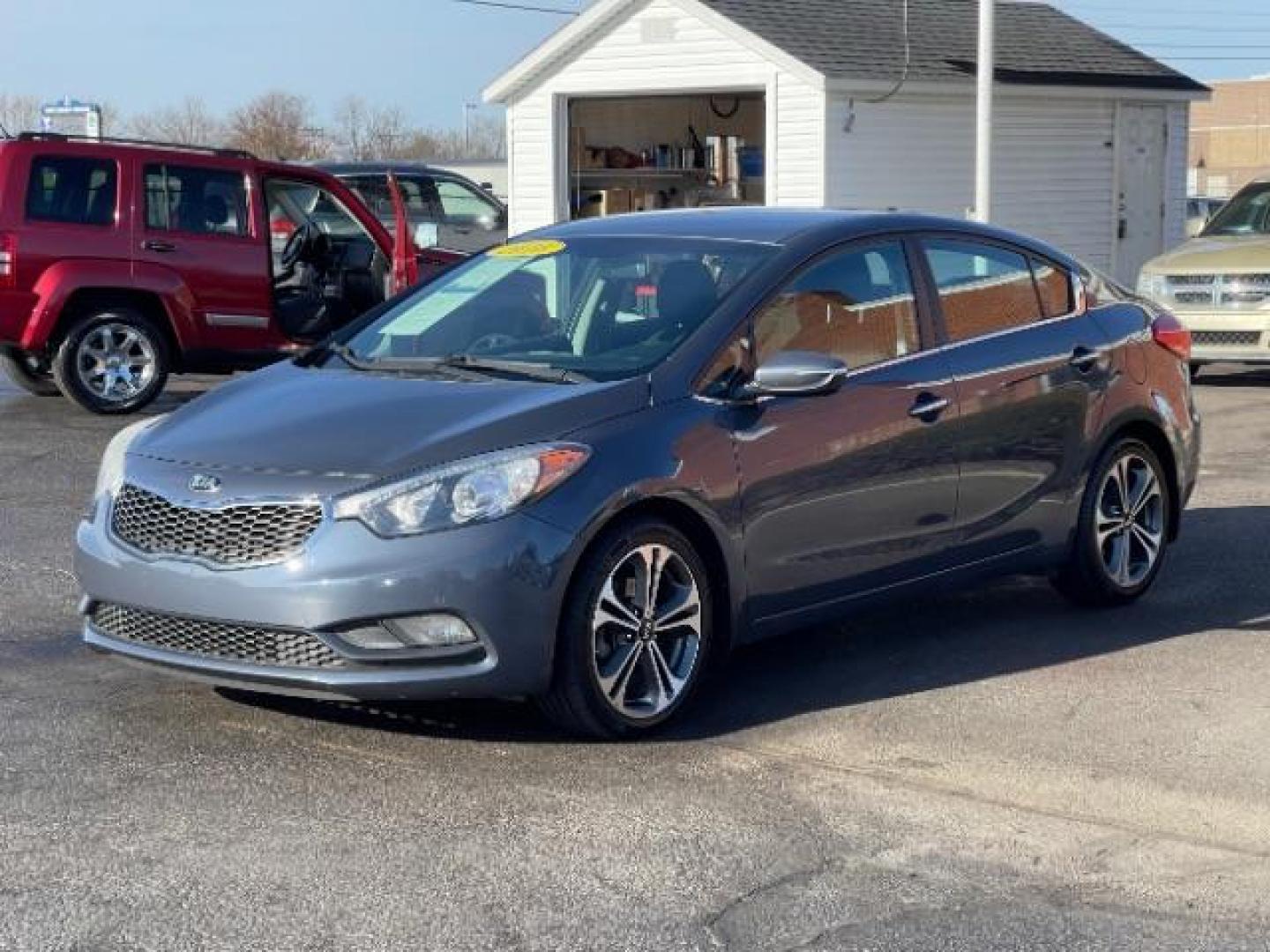 2016 Graphite Steel Kia Forte EX (KNAFX4A85G5) with an 2.0L L4 DOHC 16V engine, 6-Speed Automatic transmission, located at 1230 East Main St, Xenia, OH, 45385, (937) 908-9800, 39.687321, -83.910294 - Photo#1