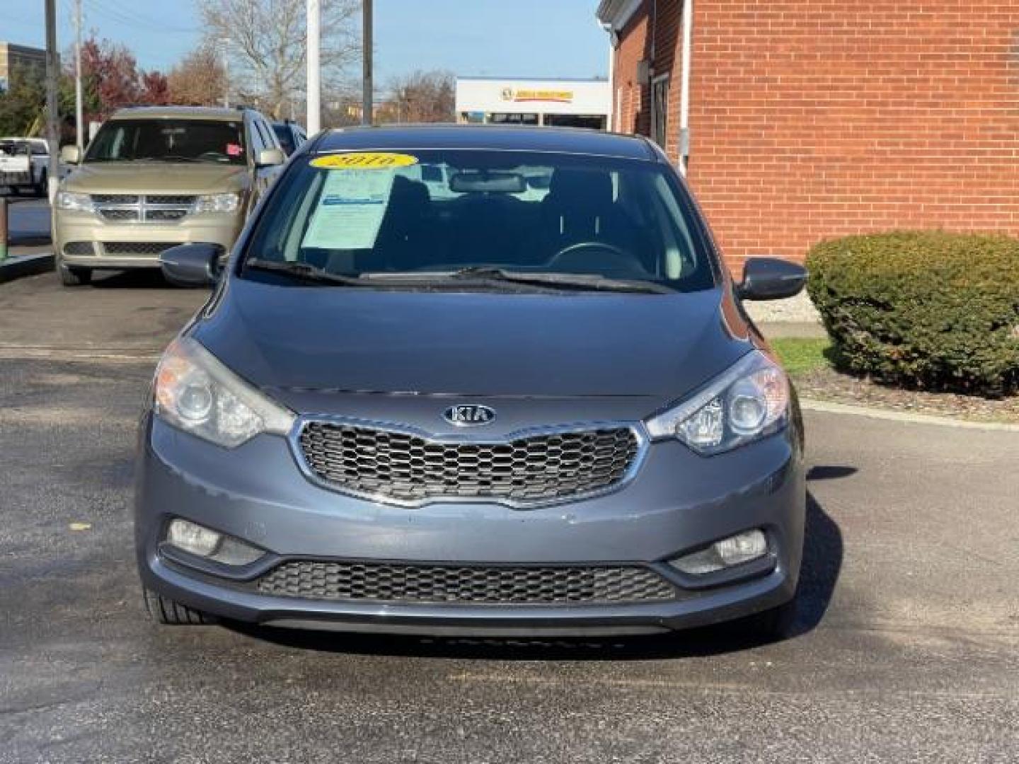 2016 Graphite Steel Kia Forte EX (KNAFX4A85G5) with an 2.0L L4 DOHC 16V engine, 6-Speed Automatic transmission, located at 1230 East Main St, Xenia, OH, 45385, (937) 908-9800, 39.687321, -83.910294 - Photo#4