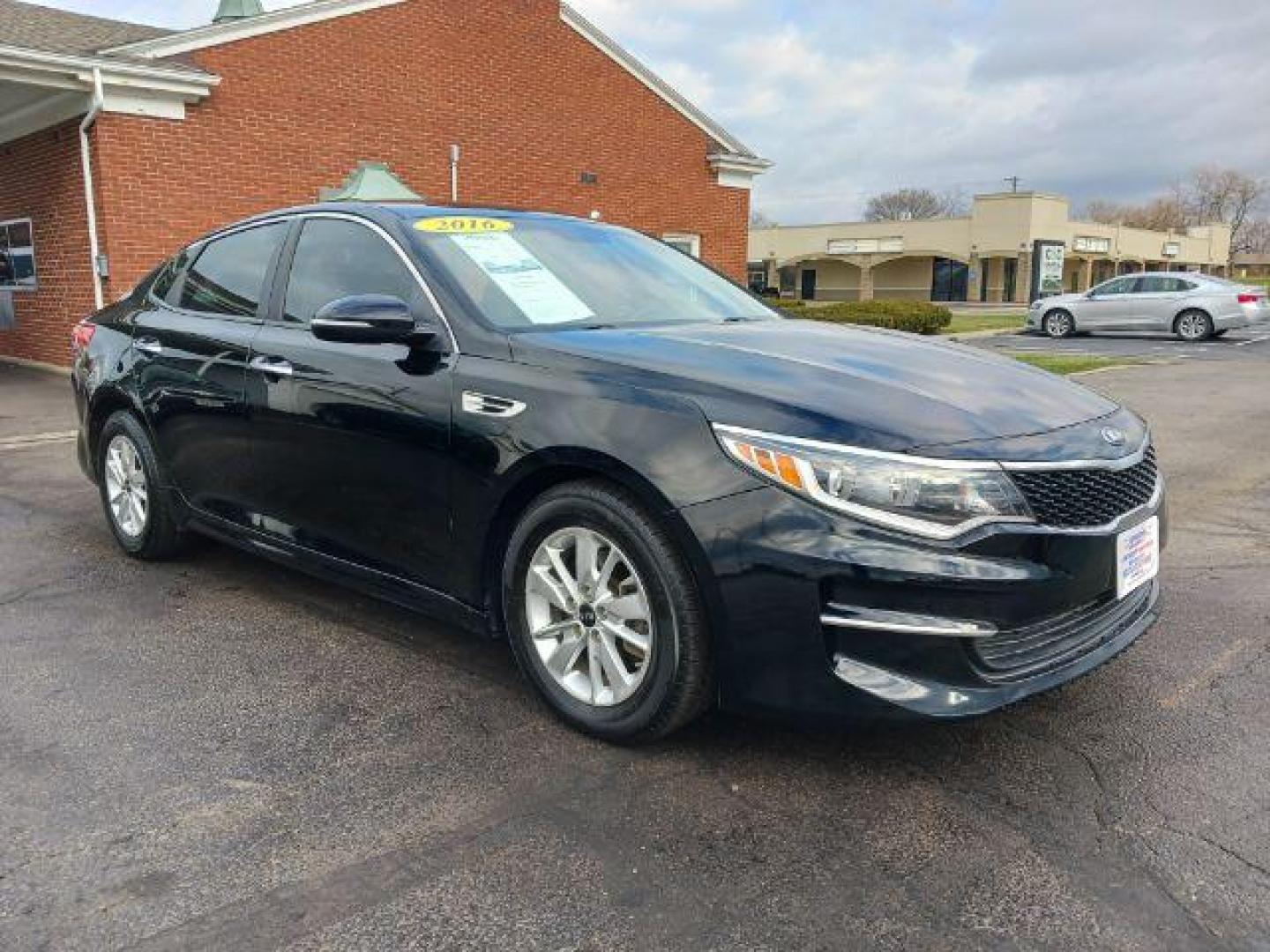 2016 Ebony Black Kia Optima LX (5XXGT4L39GG) with an 2.4L L4 DOHC 16V engine, 6-Speed Automatic transmission, located at 1230 East Main St, Xenia, OH, 45385, (937) 908-9800, 39.687321, -83.910294 - Photo#0