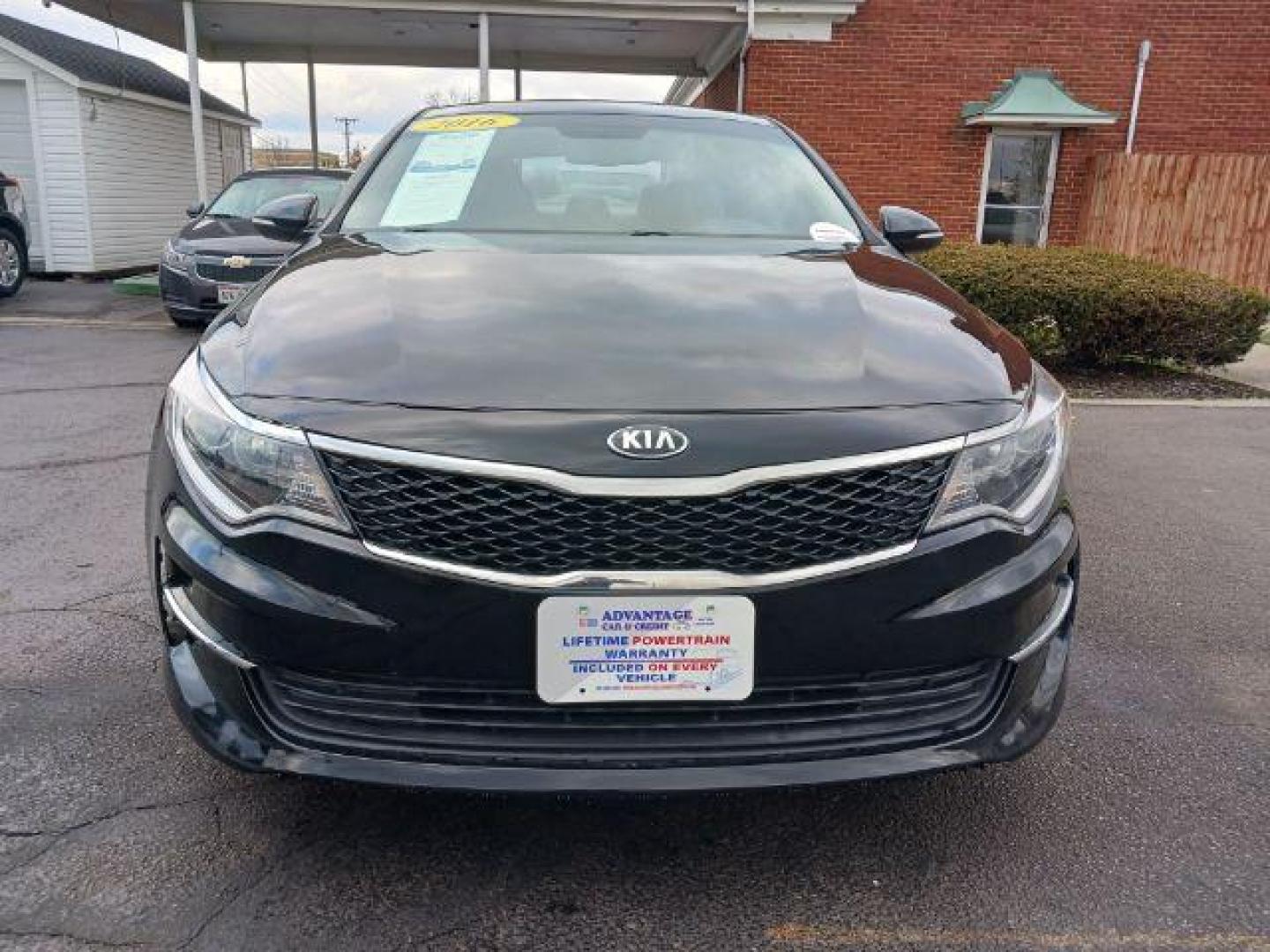 2016 Ebony Black Kia Optima LX (5XXGT4L39GG) with an 2.4L L4 DOHC 16V engine, 6-Speed Automatic transmission, located at 1230 East Main St, Xenia, OH, 45385, (937) 908-9800, 39.687321, -83.910294 - Photo#1