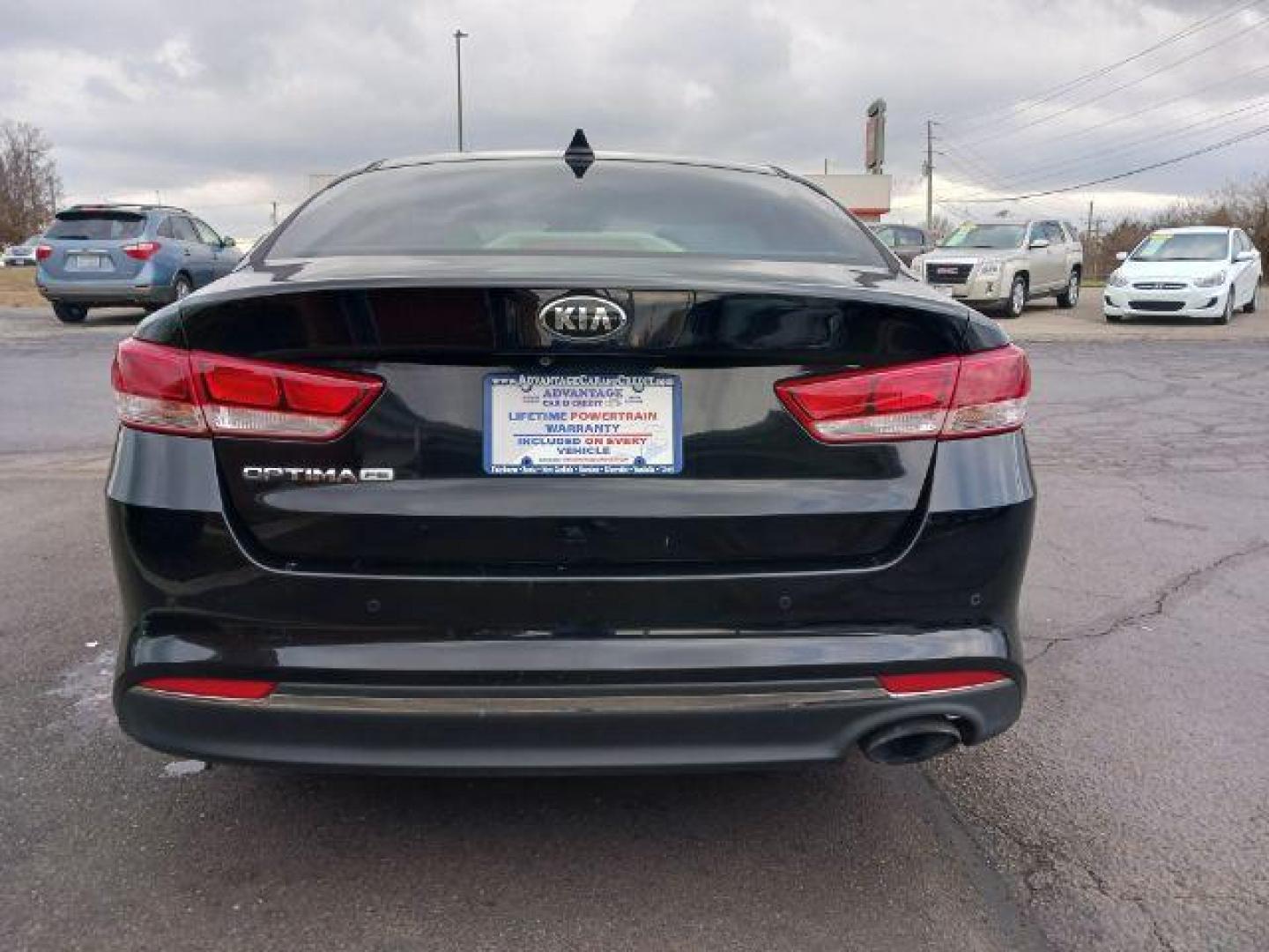 2016 Ebony Black Kia Optima LX (5XXGT4L39GG) with an 2.4L L4 DOHC 16V engine, 6-Speed Automatic transmission, located at 1230 East Main St, Xenia, OH, 45385, (937) 908-9800, 39.687321, -83.910294 - Photo#5