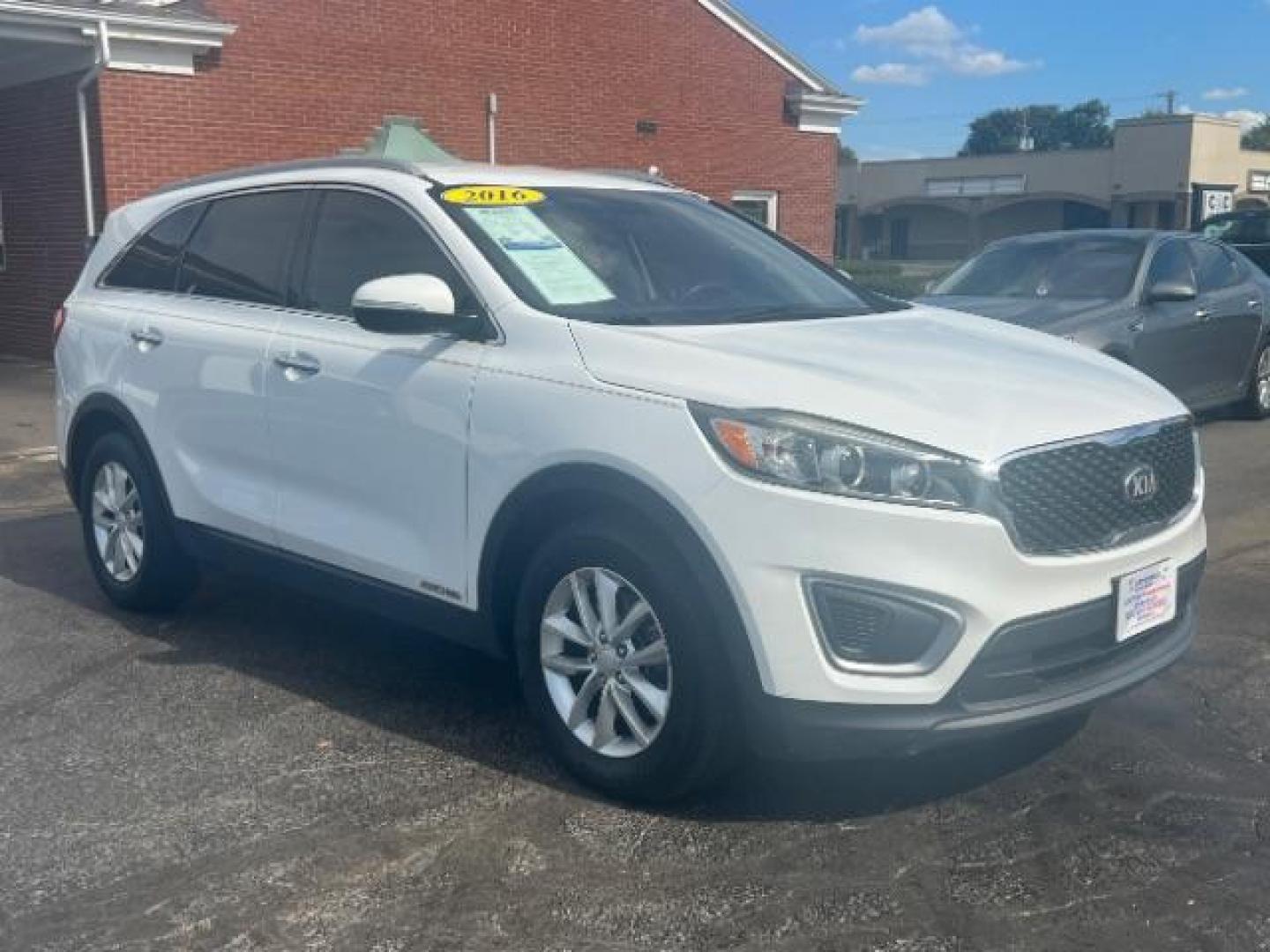 2016 Snow White Pearl Kia Sorento LX V6 AWD (5XYPGDA50GG) with an 3.3L V6 DOHC 24V engine, 6-Speed Automatic transmission, located at 1951 S Dayton Lakeview Rd., New Carlisle, OH, 45344, (937) 908-9800, 39.890999, -84.050255 - Photo#0