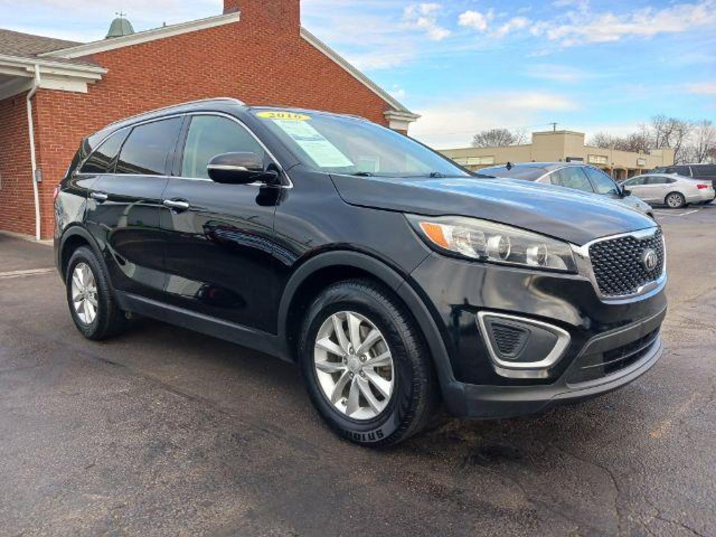 2016 Ebony Black Kia Sorento LX 2WD (5XYPG4A34GG) with an 2.4L L4 DOHC 16V engine, 6-Speed Automatic transmission, located at 4508 South Dixie Dr, Moraine, OH, 45439, (937) 908-9800, 39.690136, -84.216438 - Photo#0