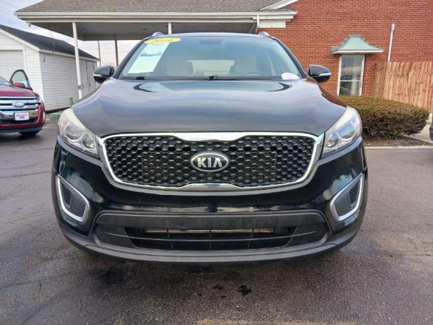 2016 Ebony Black Kia Sorento LX 2WD (5XYPG4A34GG) with an 2.4L L4 DOHC 16V engine, 6-Speed Automatic transmission, located at 4508 South Dixie Dr, Moraine, OH, 45439, (937) 908-9800, 39.690136, -84.216438 - Photo#1