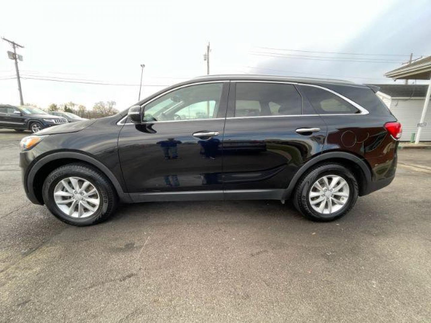 2016 Ebony Black Kia Sorento LX 2WD (5XYPG4A34GG) with an 2.4L L4 DOHC 16V engine, 6-Speed Automatic transmission, located at 4508 South Dixie Dr, Moraine, OH, 45439, (937) 908-9800, 39.690136, -84.216438 - Photo#3