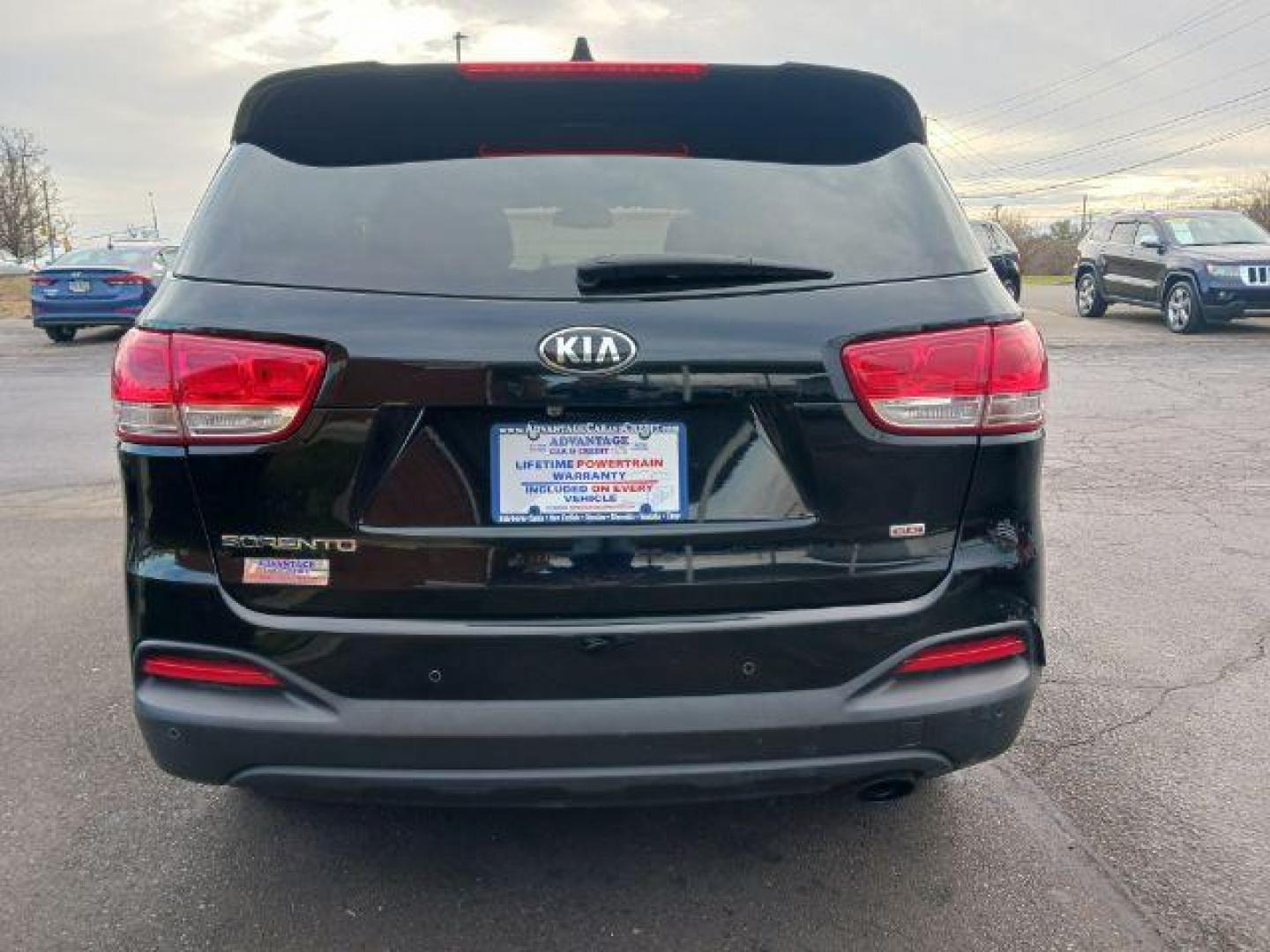 2016 Ebony Black Kia Sorento LX 2WD (5XYPG4A34GG) with an 2.4L L4 DOHC 16V engine, 6-Speed Automatic transmission, located at 4508 South Dixie Dr, Moraine, OH, 45439, (937) 908-9800, 39.690136, -84.216438 - Photo#5