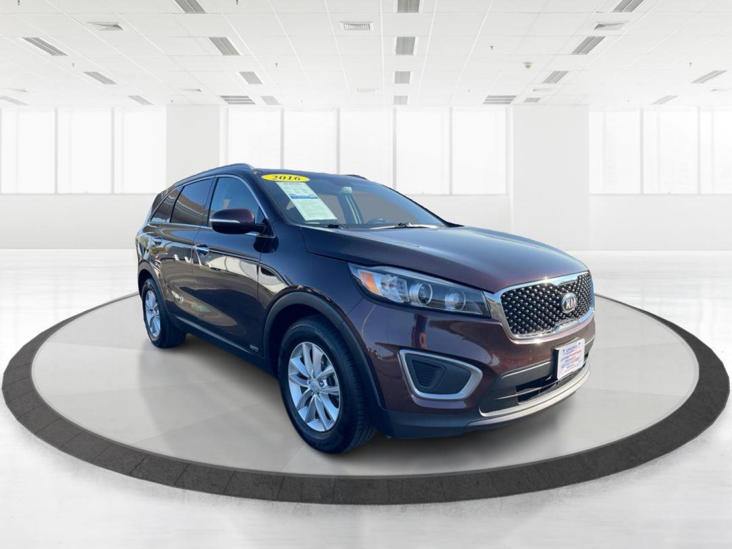 2016 Dark Cherry Kia Sorento LX AWD (5XYPGDA31GG) with an 2.4L L4 DOHC 16V engine, 6-Speed Automatic transmission, located at 4508 South Dixie Dr, Moraine, OH, 45439, (937) 908-9800, 39.690136, -84.216438 - Photo#0