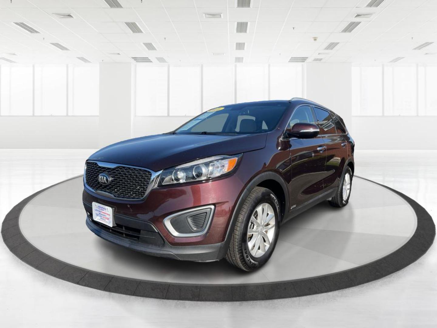 2016 Dark Cherry Kia Sorento LX AWD (5XYPGDA31GG) with an 2.4L L4 DOHC 16V engine, 6-Speed Automatic transmission, located at 4508 South Dixie Dr, Moraine, OH, 45439, (937) 908-9800, 39.690136, -84.216438 - Photo#7