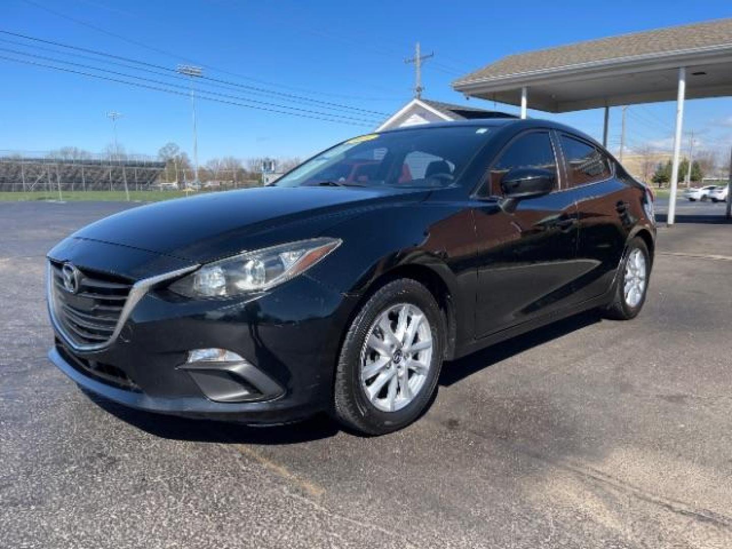 2016 Jet Black Mica Mazda MAZDA3 i Sport AT 4-Door (JM1BM1U73G1) with an 2.0L L4 DOHC 16V engine, 6-Speed Automatic transmission, located at 880 E. National Road, Vandalia, OH, 45377, (937) 908-9800, 39.892189, -84.181015 - Photo#1