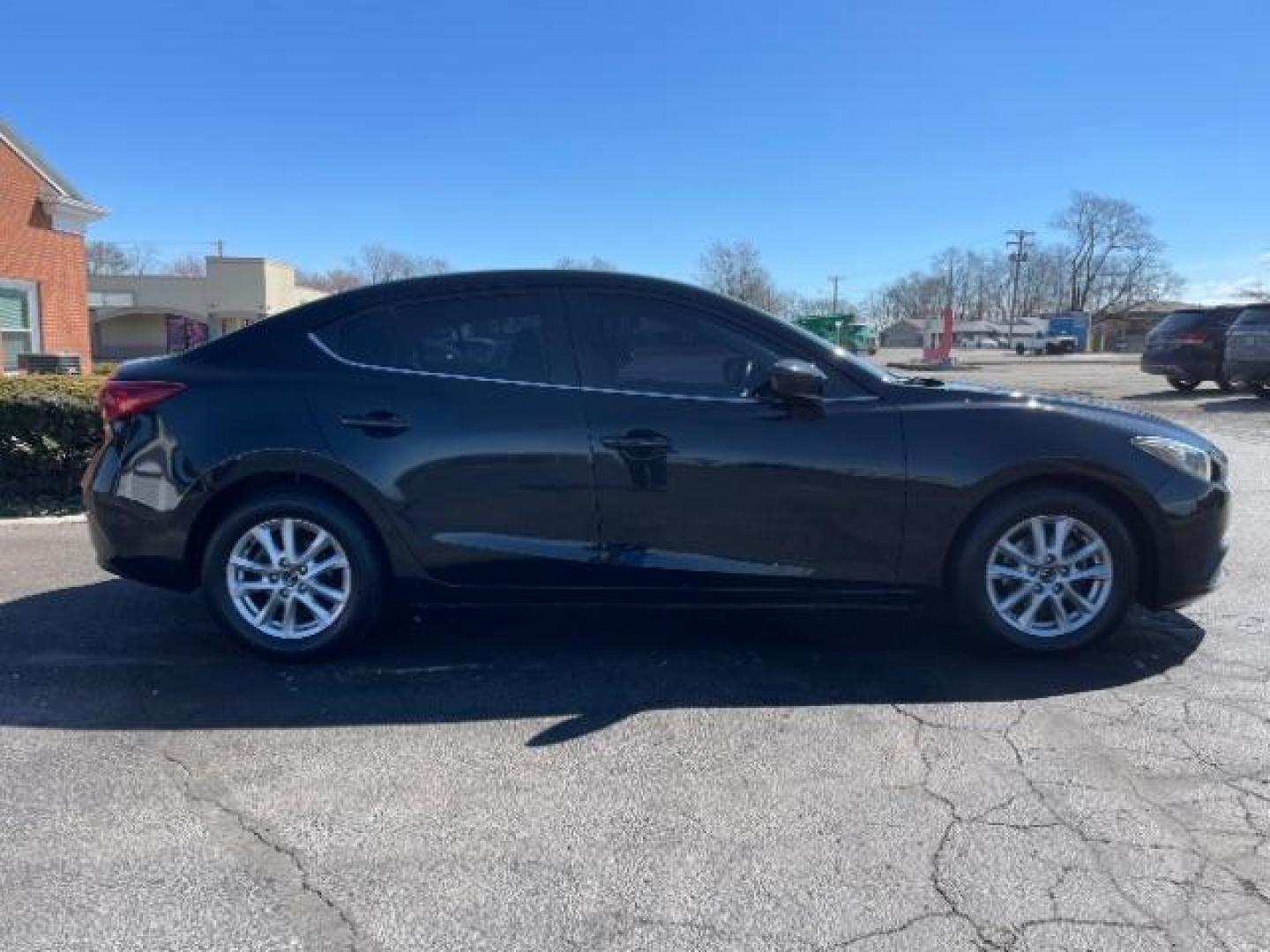 2016 Jet Black Mica Mazda MAZDA3 i Sport AT 4-Door (JM1BM1U73G1) with an 2.0L L4 DOHC 16V engine, 6-Speed Automatic transmission, located at 880 E. National Road, Vandalia, OH, 45377, (937) 908-9800, 39.892189, -84.181015 - Photo#3